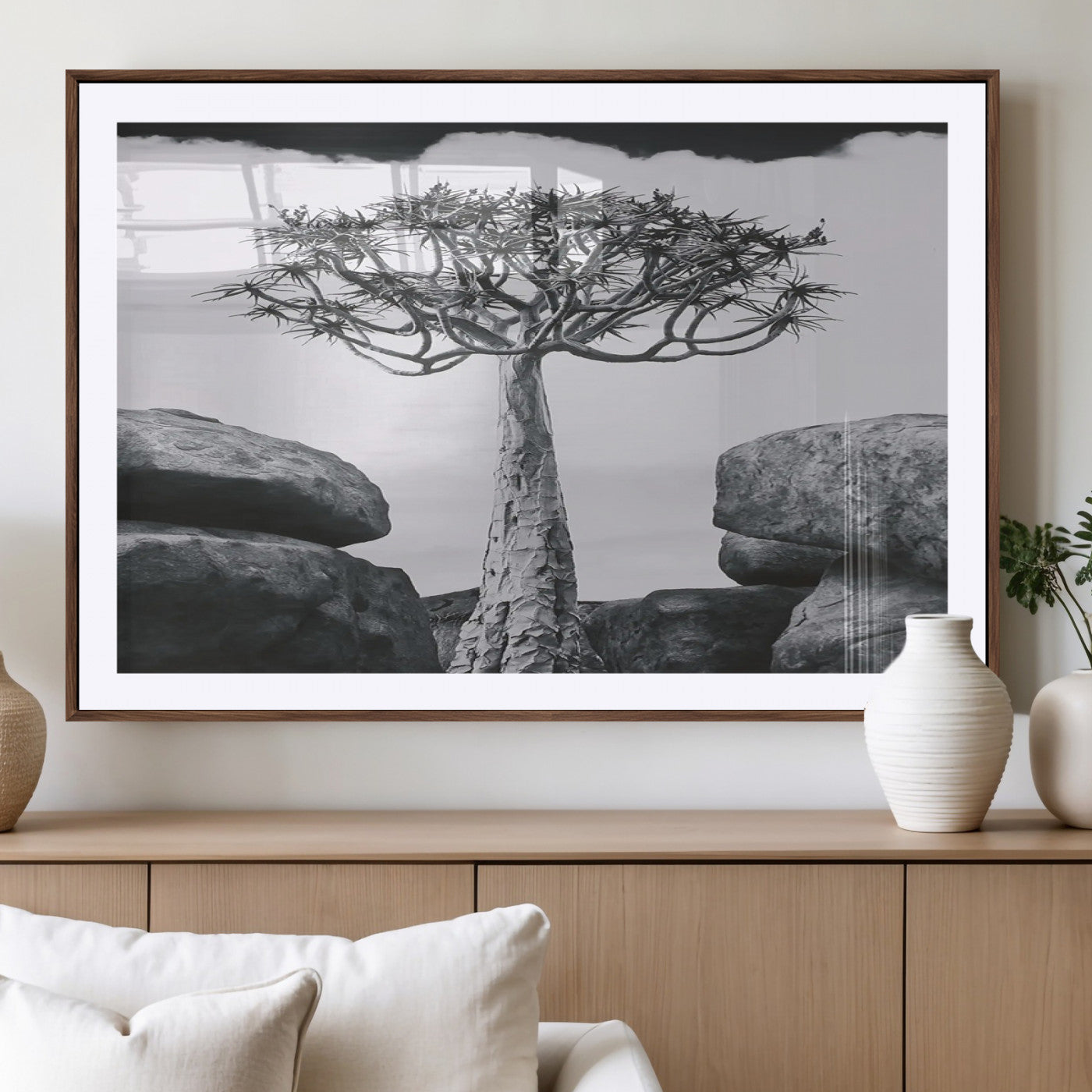 Black and white Joshua tree with bold rocky background, ideal for minimalist or desert-inspired home wall decoration.