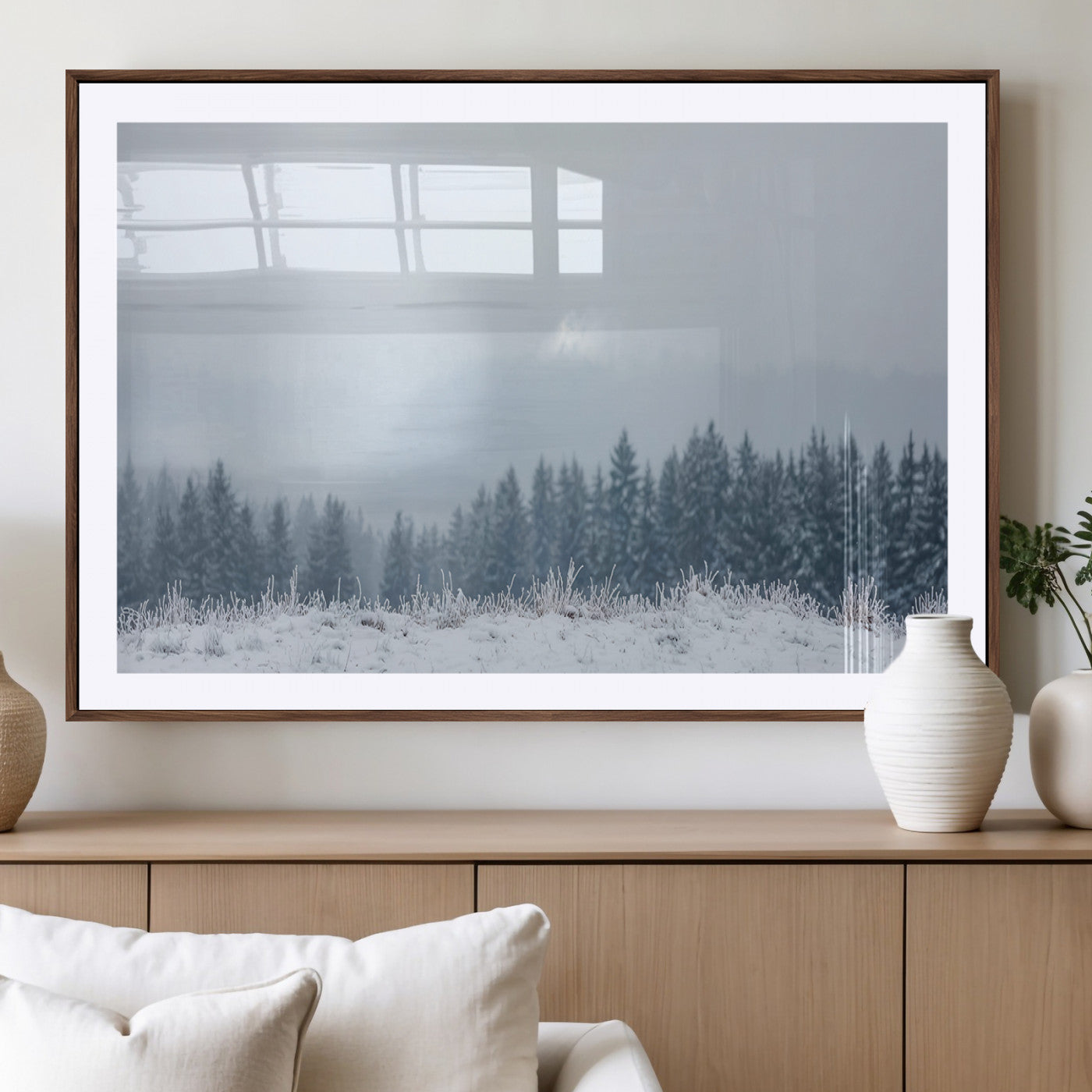 Snow-covered forest under misty sky, soft light breaking through clouds, ideal for minimalist or Nordic-inspired home decor.