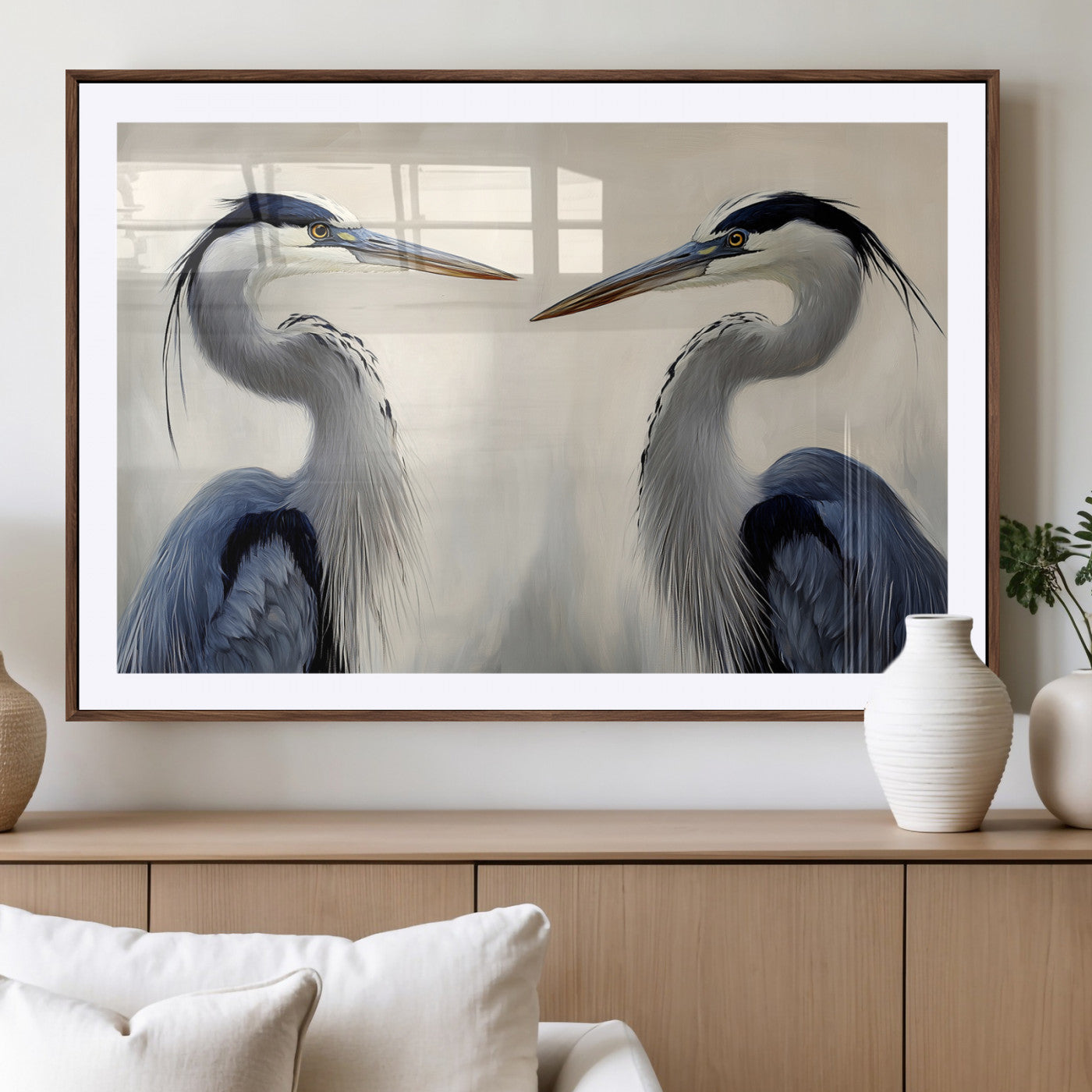Two blue herons facing each other on a soft neutral background, ideal for coastal, tranquil, or nature-inspired minimalist interiors.