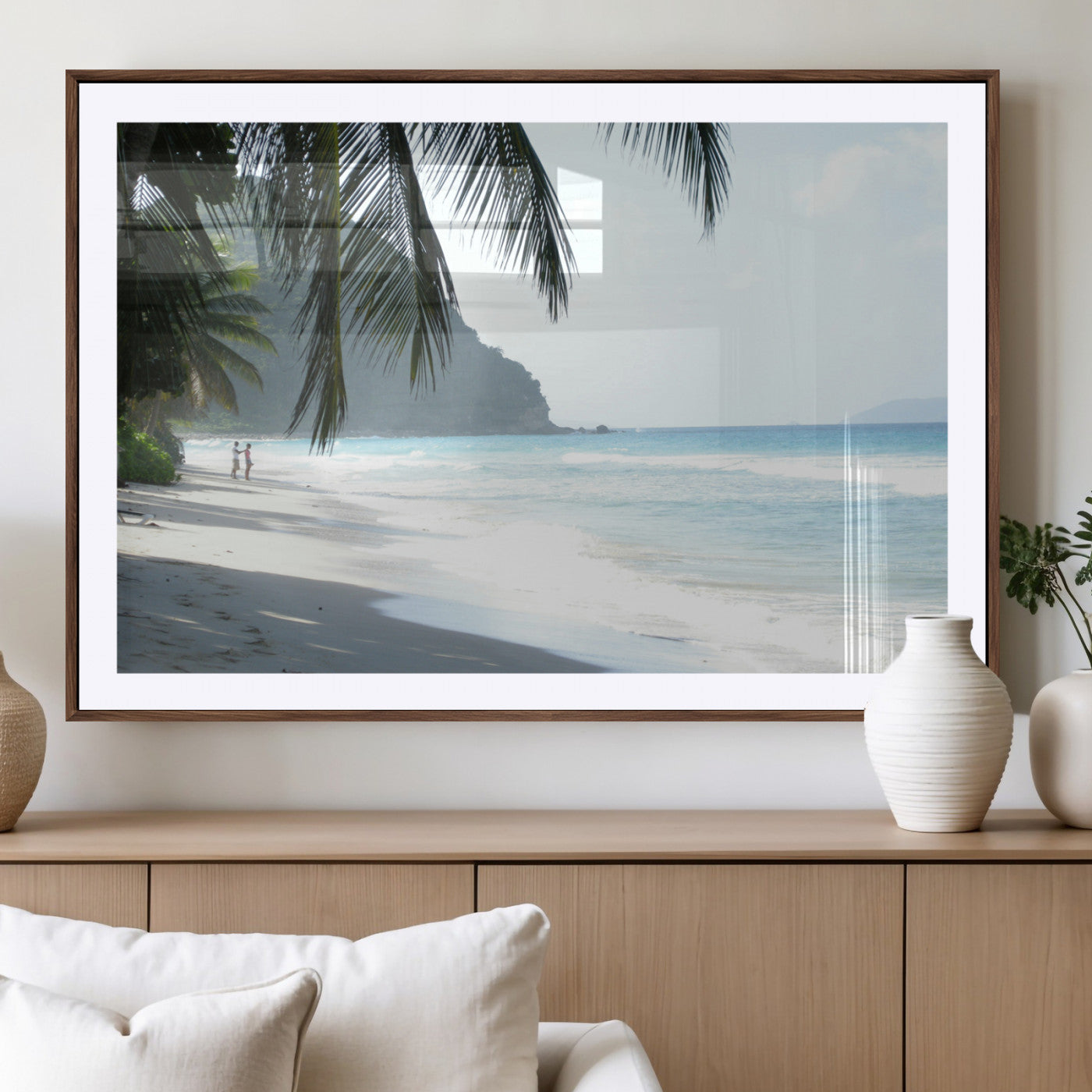 Tropical beach with palm tree shadows, white sand, and turquoise ocean waves, creating a serene and relaxing island escape atmosphere.