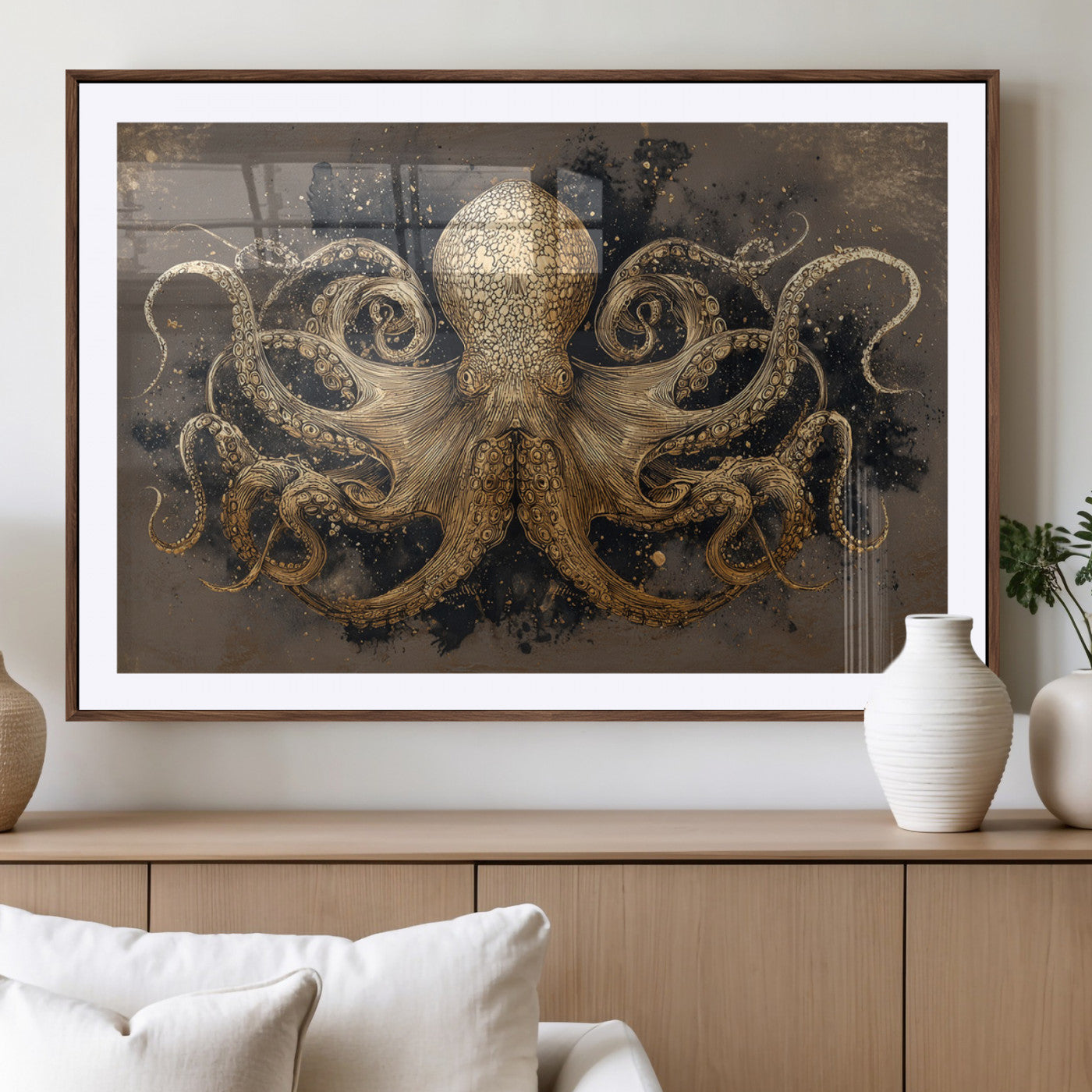 A beautifully detailed illustration of an octopus in gold ink on a textured dark background, with swirling tentacles and intricate patterns.