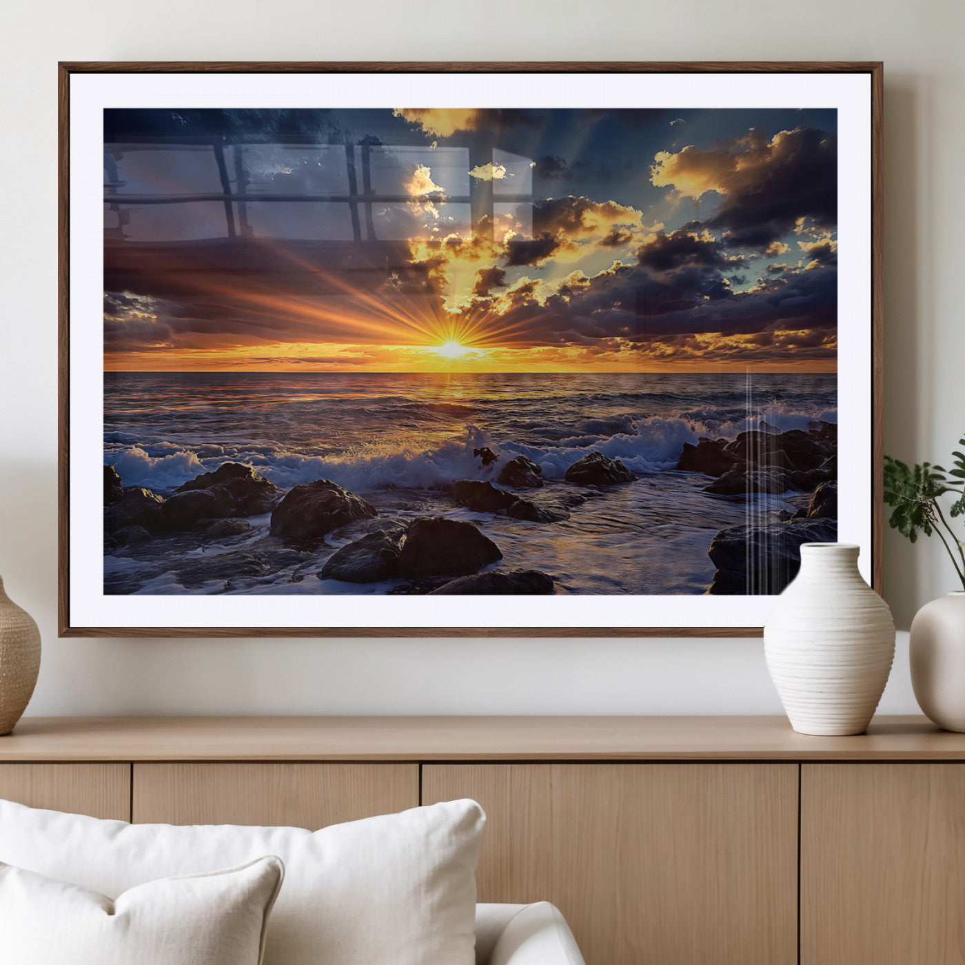 An explosive sunset over the ocean with dramatic clouds and rays of sunlight reflecting off the water, creating a vibrant and captivating view.