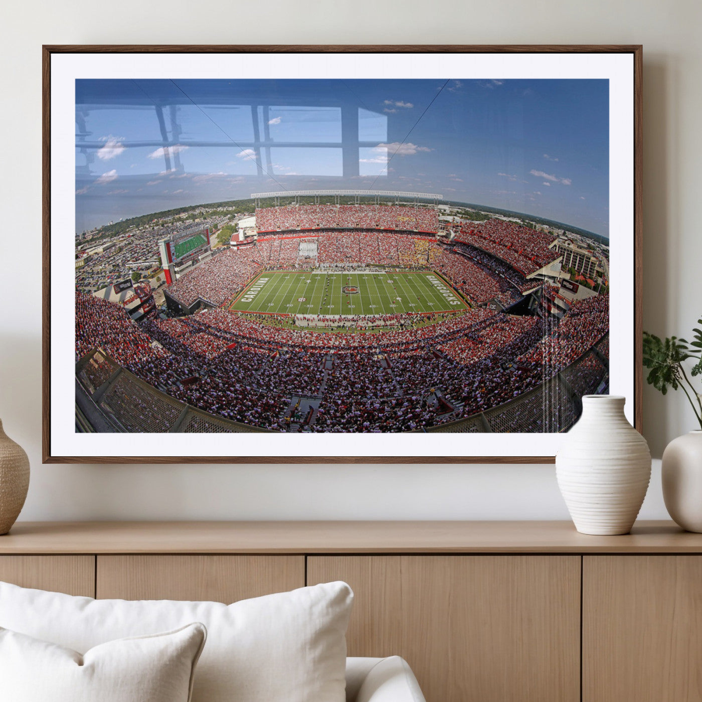 An William Brice-Stadium view of a full football stadium with cheering fans and clear blue skies, capturing the excitement and energy of the game.