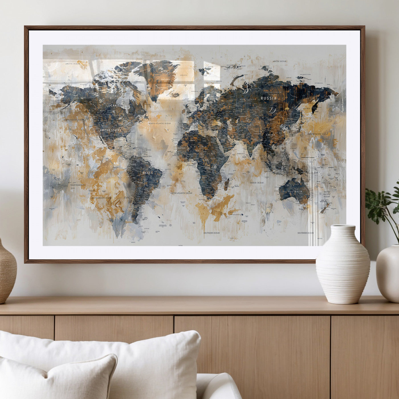 Artistic world map with textured brush strokes in shades of gold, navy blue, and white, showing continents and countries with an abstract, painterly effect.