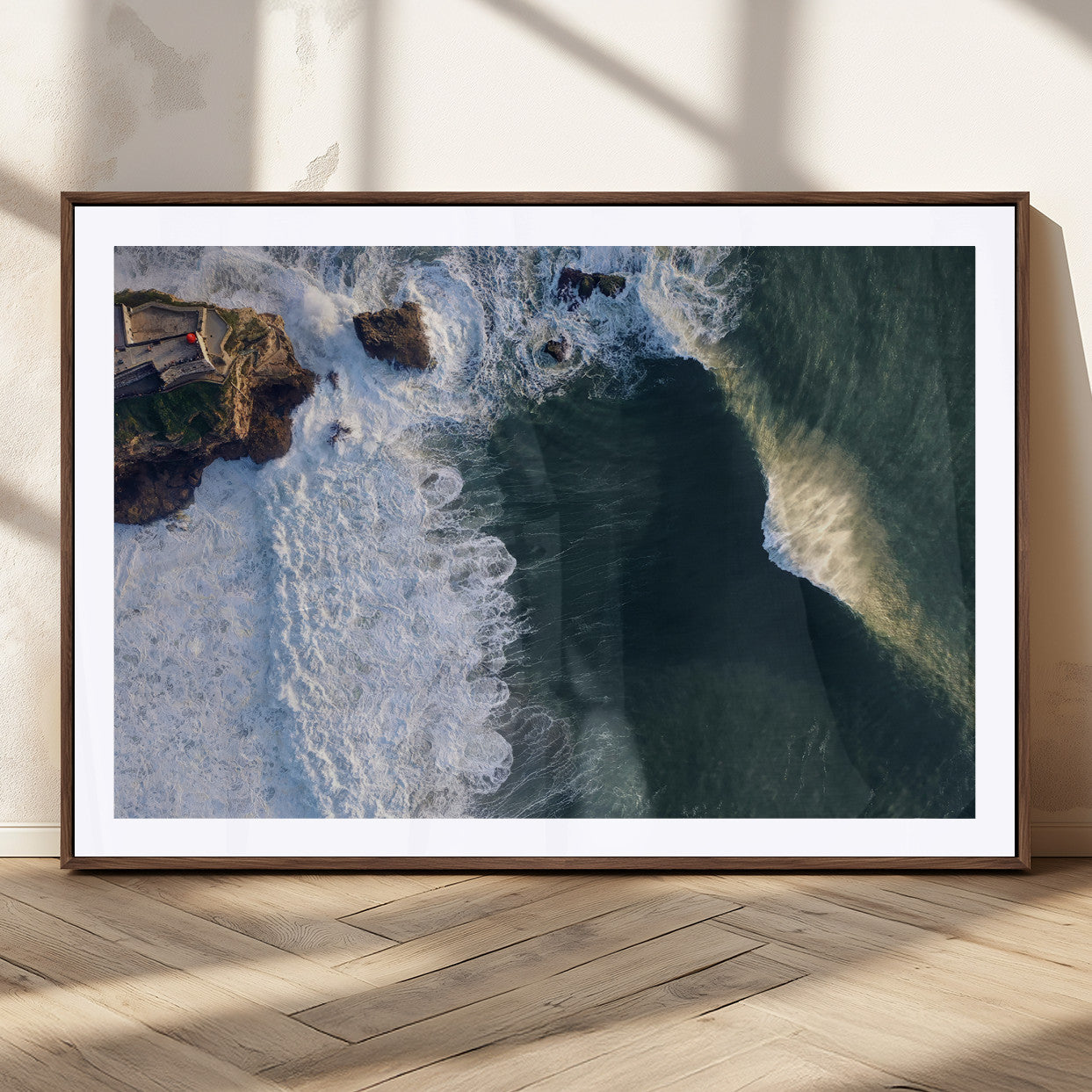 Canvas showing an aerial view of crashing waves along the Nazaré coastline, perfect for dramatic coastal or ocean-themed home decor.