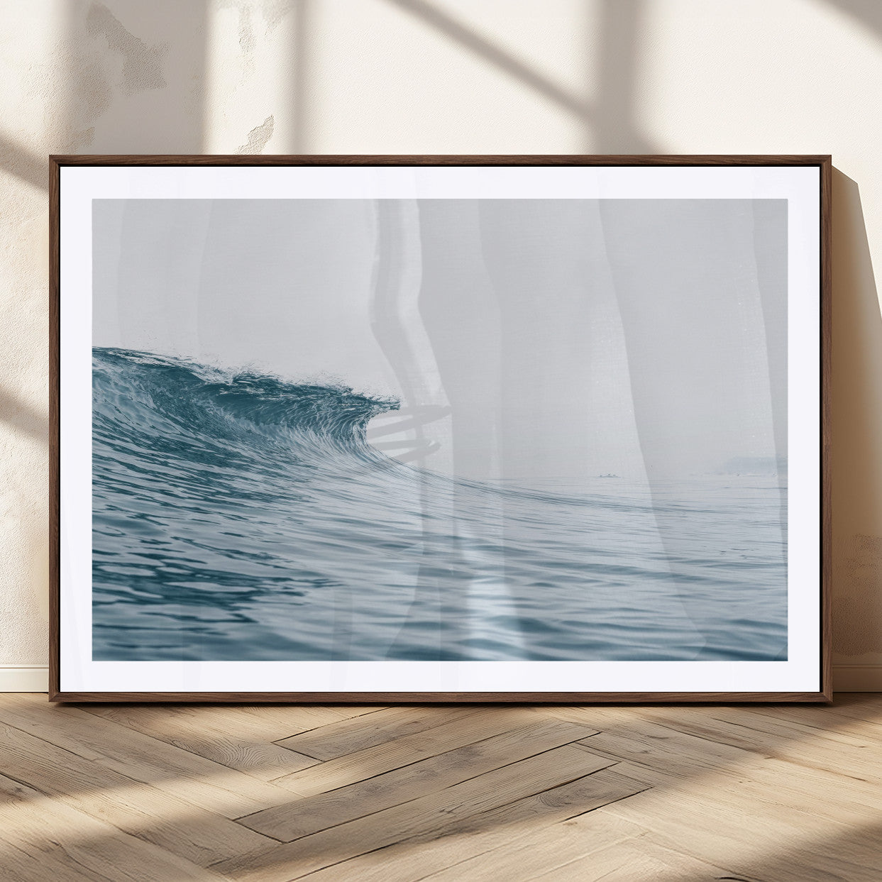 A single ocean wave curling in soft blue tones under a misty sky, ideal for coastal or minimalist home wall decor.
