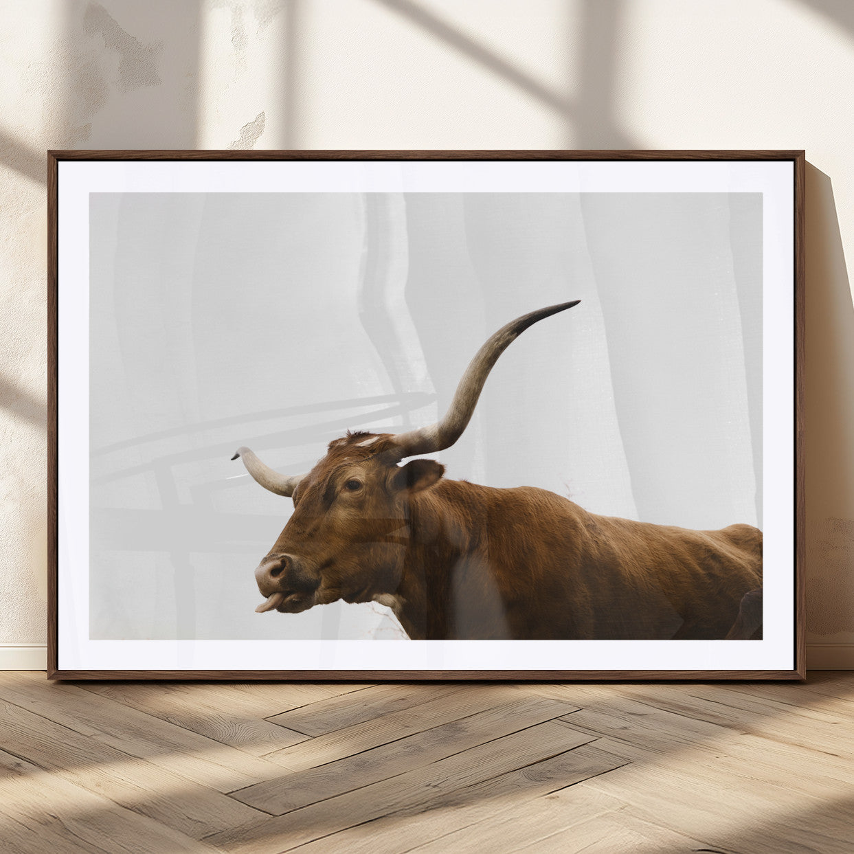 Side view of a brown Longhorn cow with curved horns on white background, perfect for rustic farmhouse or western-style home decor.