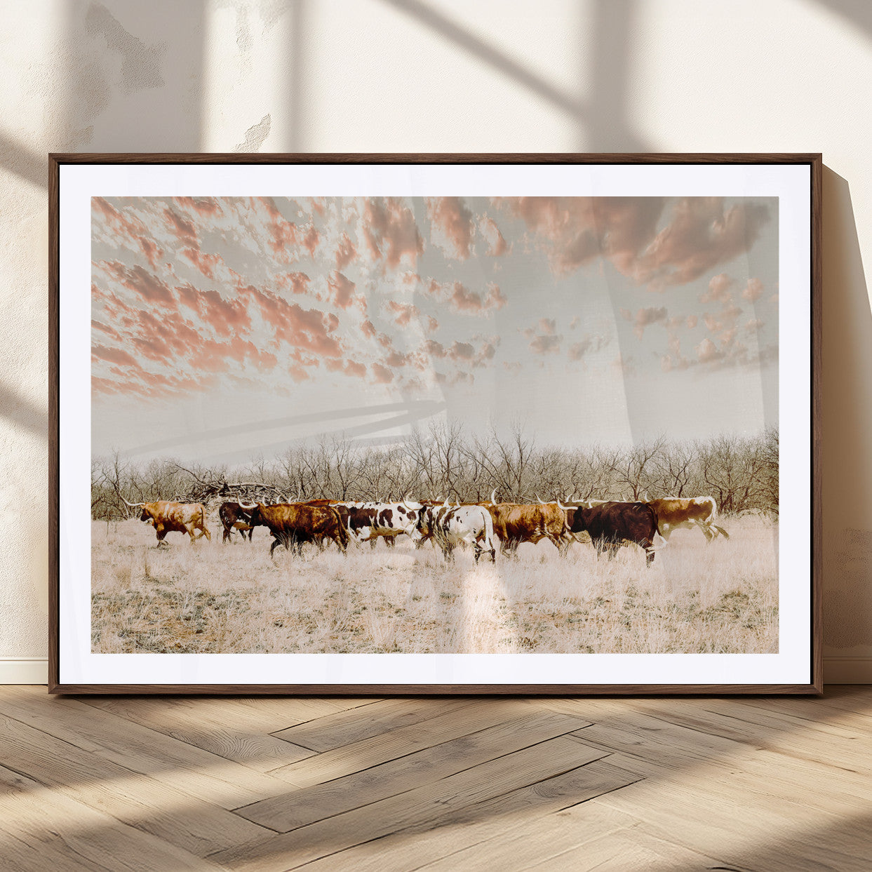 Cattle herd in a soft-toned field under a pastel pink sky, creating a peaceful rustic feel, perfect for farmhouse or western-themed spaces.