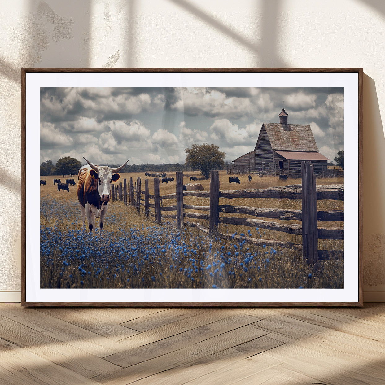 Framed canvas print of a Texas Longhorn near a rustic barn and fence, ideal for farmhouse or western-style home wall decor.
