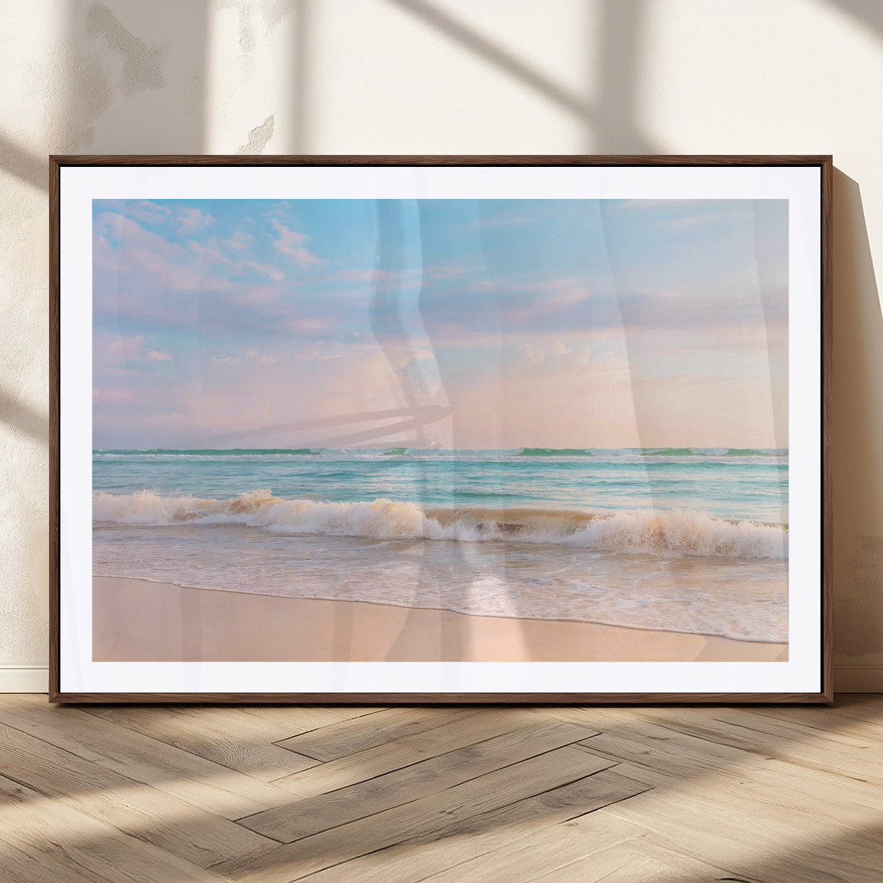 A peaceful beach scene with soft pastel skies, gentle waves washing up on the sandy shore, creating a calm and serene ocean view.