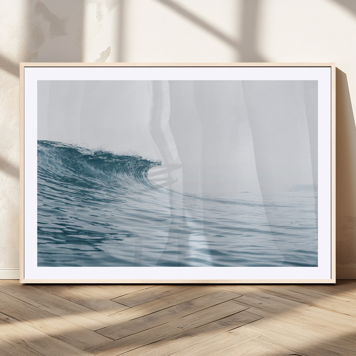 A single ocean wave curling in soft blue tones under a misty sky, ideal for coastal or minimalist home wall decor.