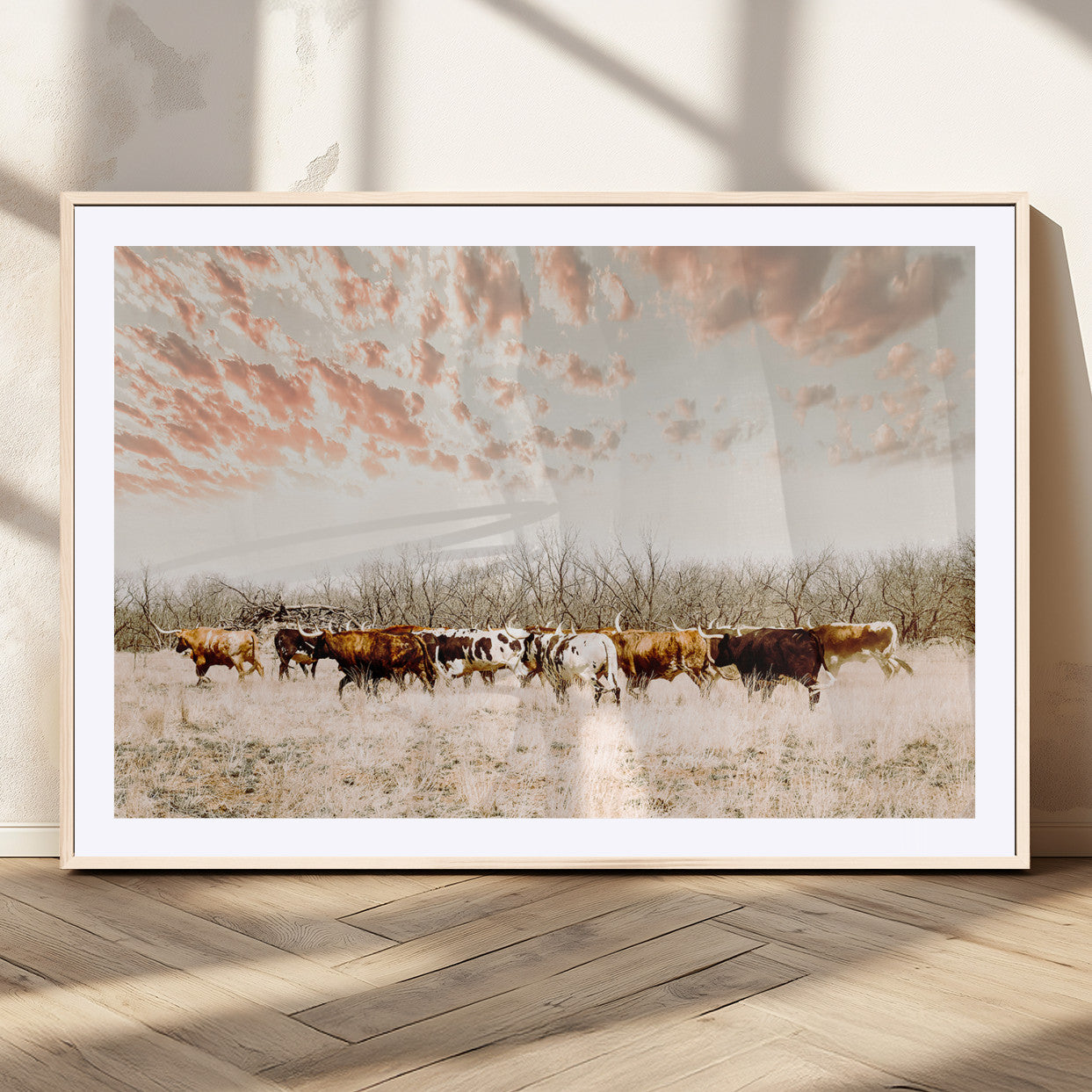 Cattle herd in a soft-toned field under a pastel pink sky, creating a peaceful rustic feel, perfect for farmhouse or western-themed spaces.
