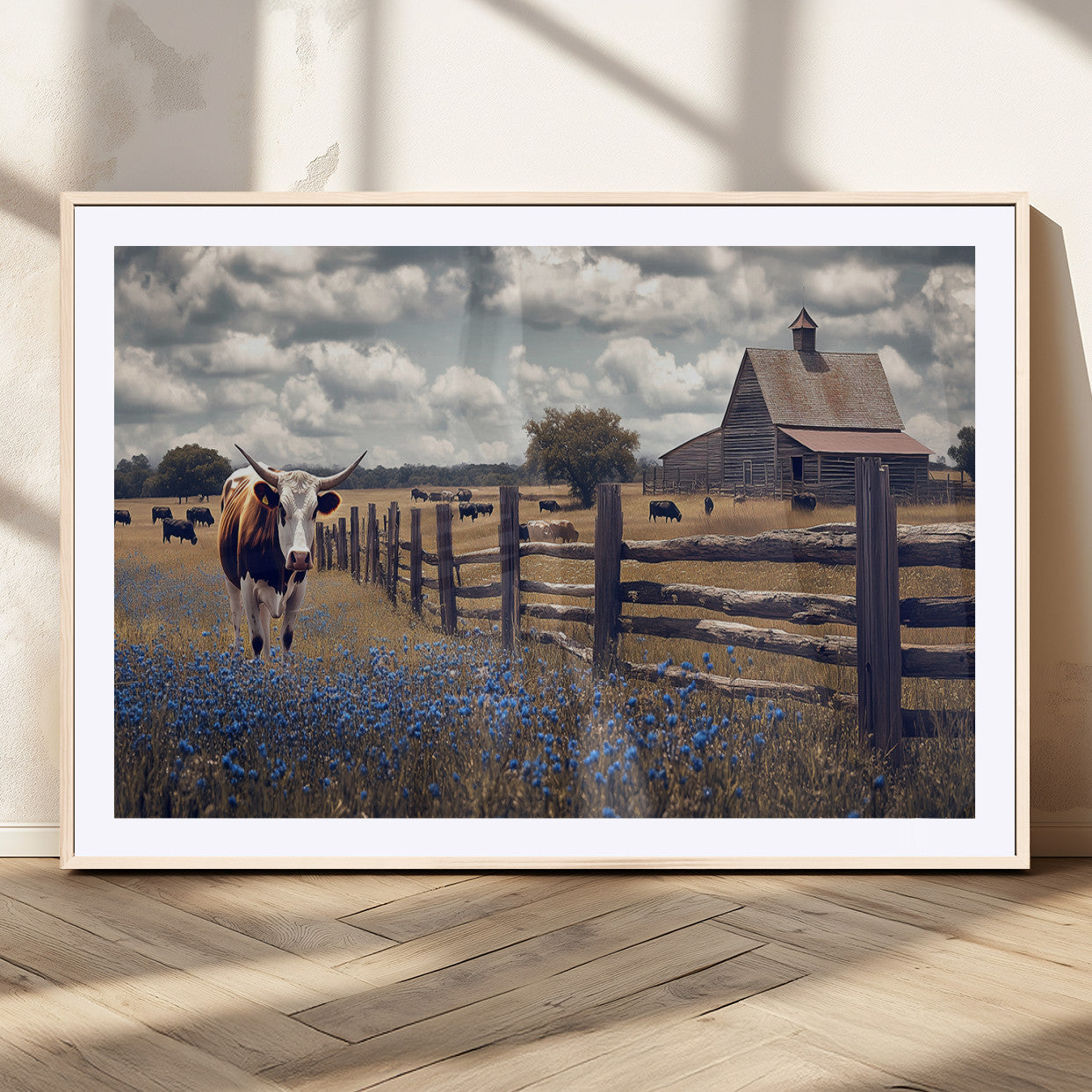 Framed canvas print of a Texas Longhorn near a rustic barn and fence, ideal for farmhouse or western-style home wall decor.