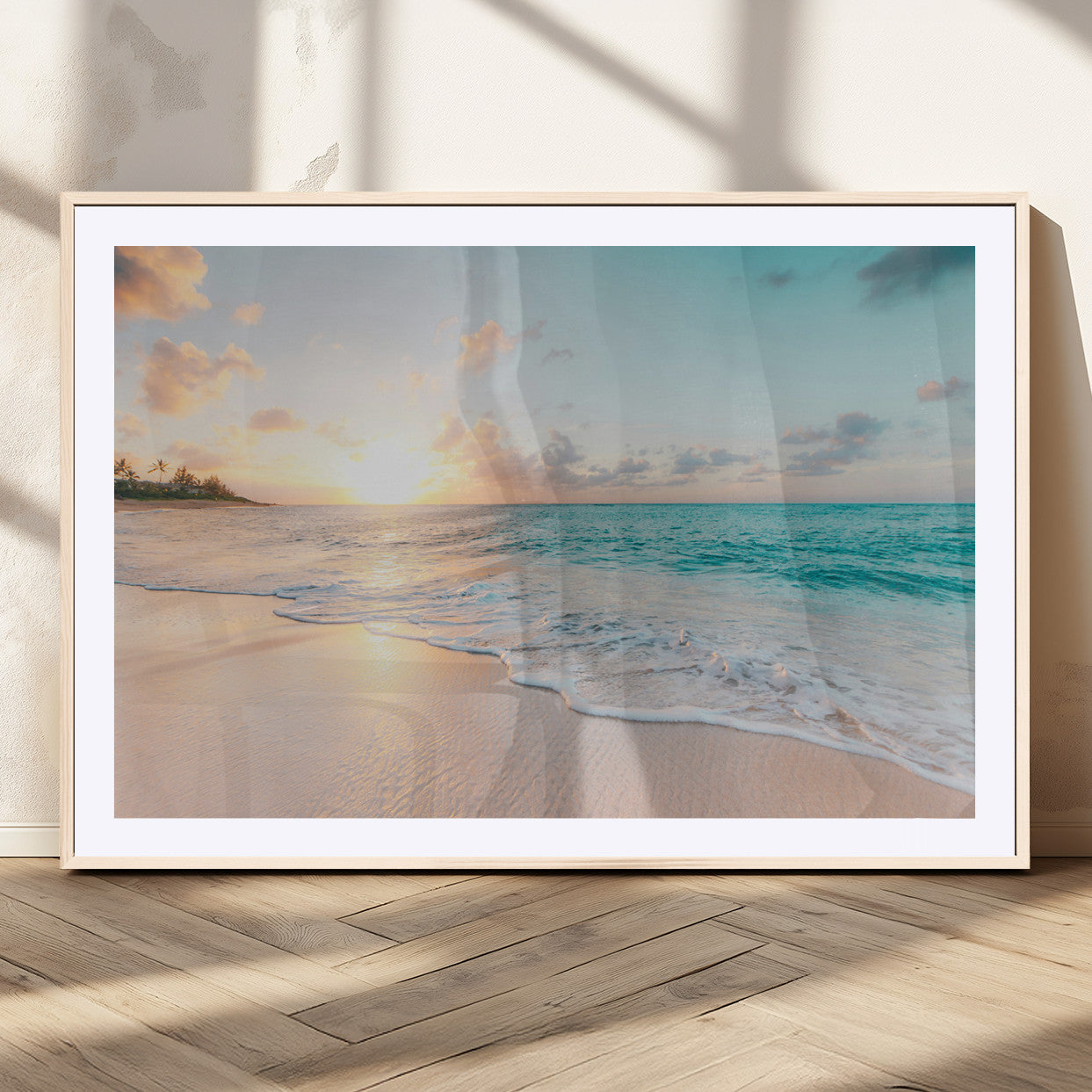 Golden sunset over a tropical beach with gentle ocean waves and soft white sand, creating a peaceful and relaxing coastal scene.