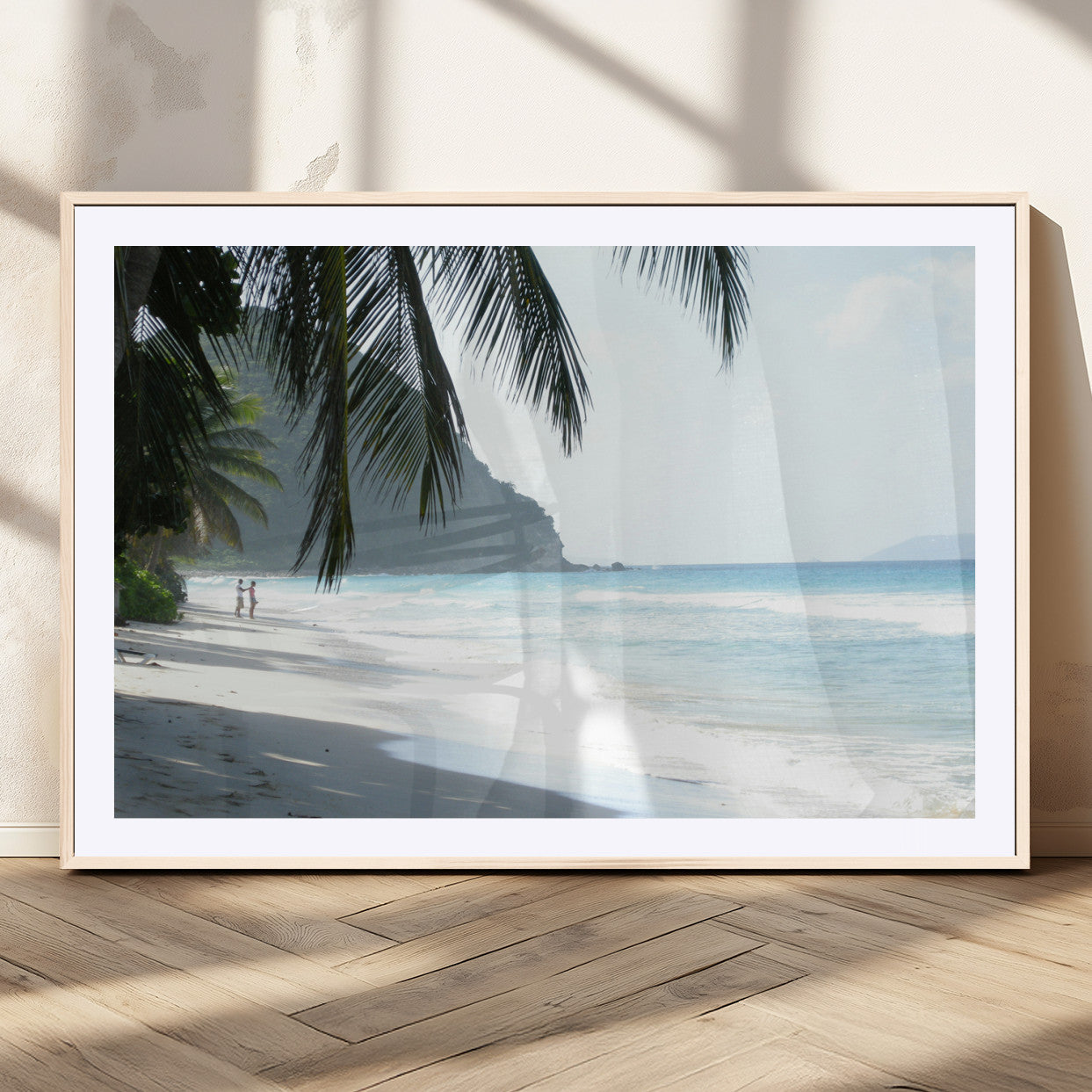 Tropical beach with palm tree shadows, white sand, and turquoise ocean waves, creating a serene and relaxing island escape atmosphere.