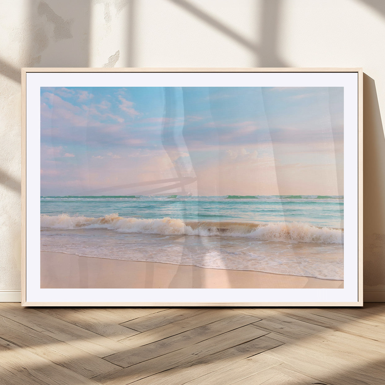 A peaceful beach scene with soft pastel skies, gentle waves washing up on the sandy shore, creating a calm and serene ocean view.