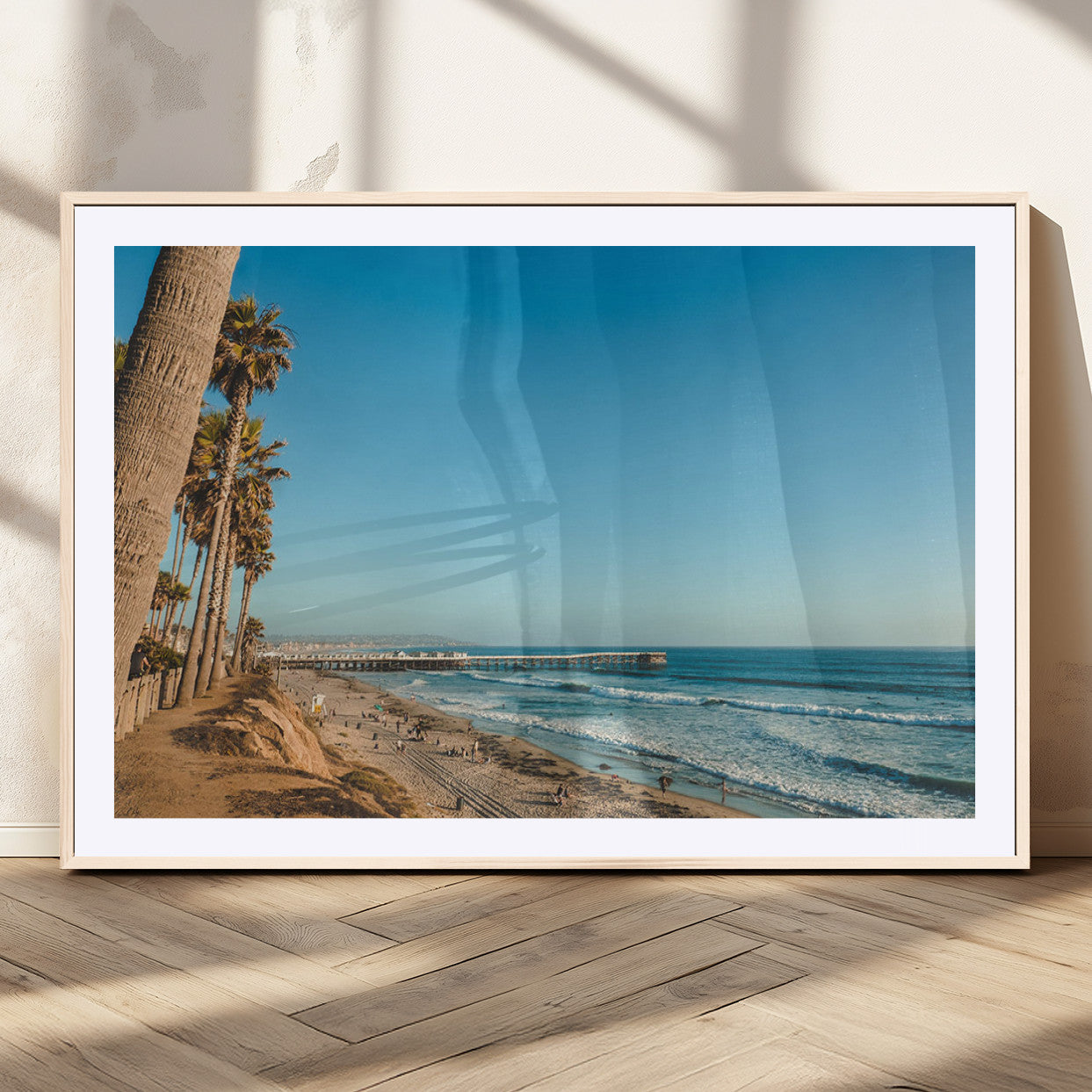 MGC-FP-36x24 - Scenic Beach with Tall Palm Trees, Sandy Shore, and Long Pier Stretching into the Calm Ocean Under
