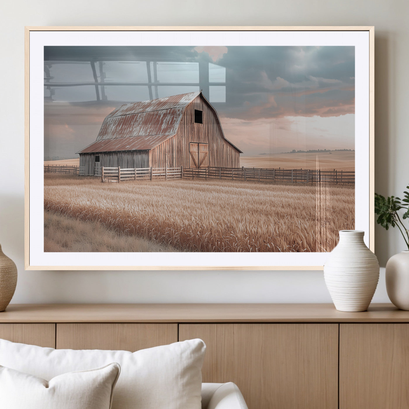 Framed canvas of a rustic barn in a golden wheat field under soft skies, ideal for vintage farmhouse or country-style wall decor.