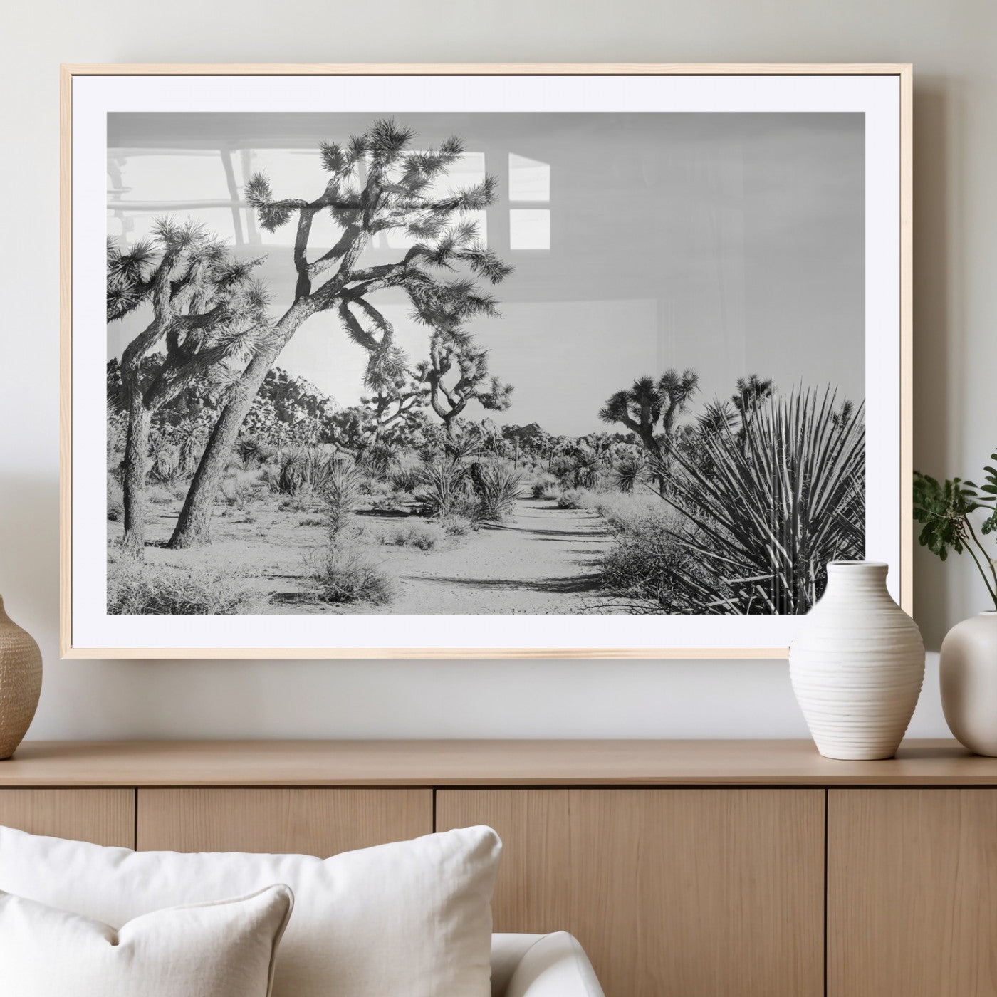 Canvas of a Joshua Tree forest in black and white tones, featuring a desert path and spiky vegetation, ideal for minimalist or rustic decor.