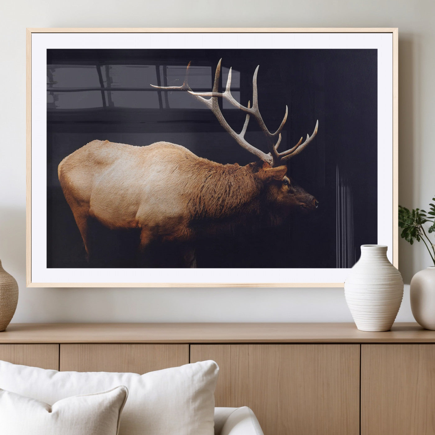 Side profile of an elk with large antlers on dark background, creating a bold rustic statement for cabin or Western-themed decor.