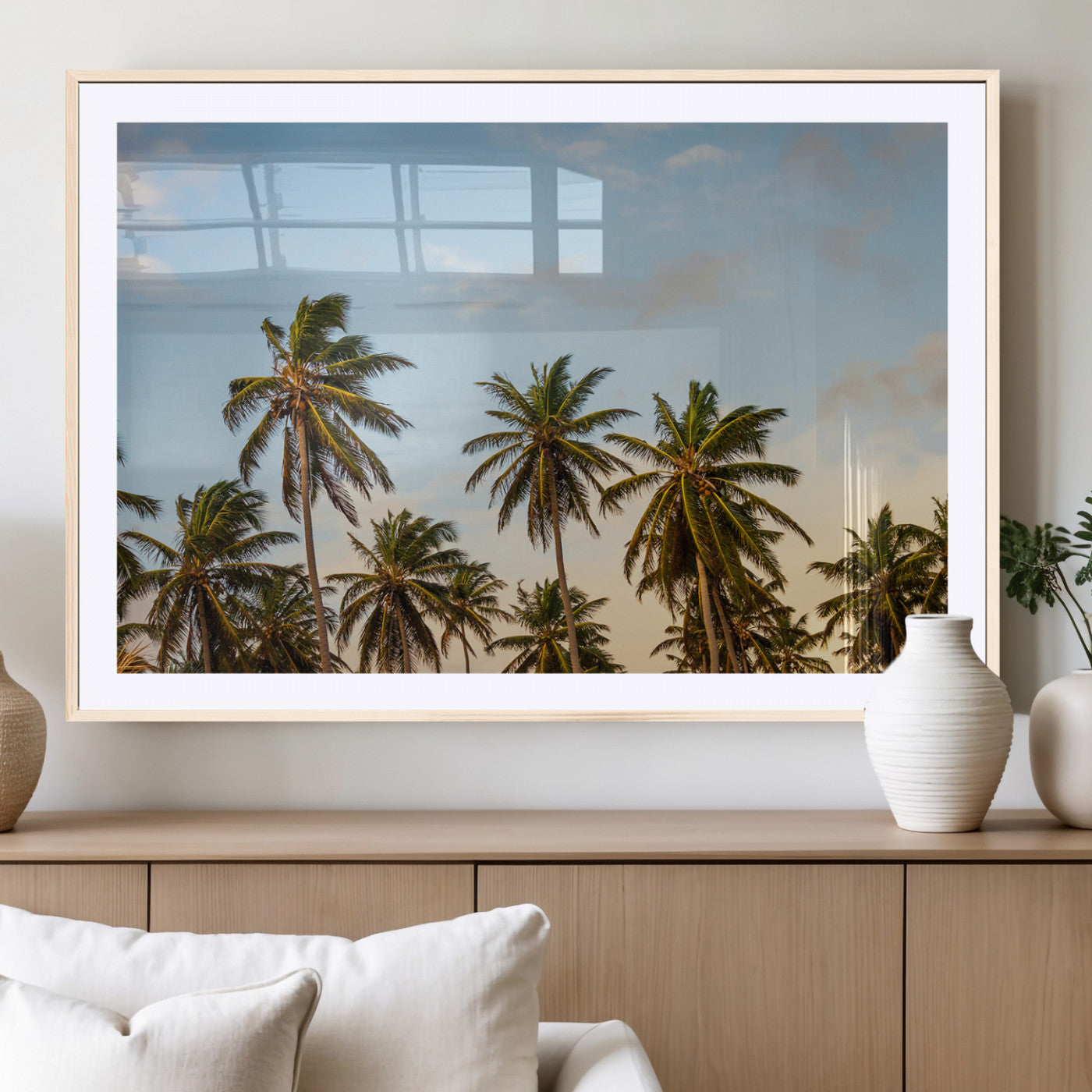 Tall palm trees swaying under a soft sunset sky, creating a tropical and relaxing atmosphere, perfect for coastal and beach-inspired wall art.