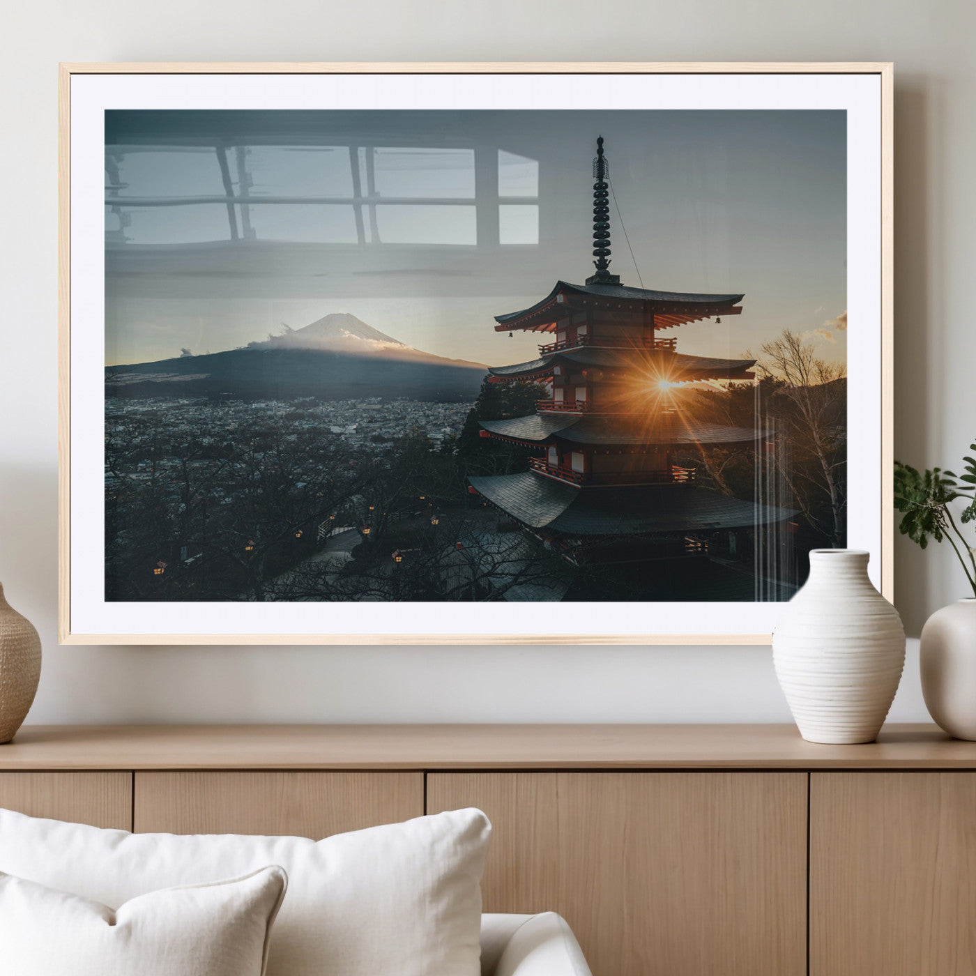Chureito Pagoda at sunset with Mount Fuji in the background, city lights below, and golden sun rays, ideal for Japanese-inspired wall art.