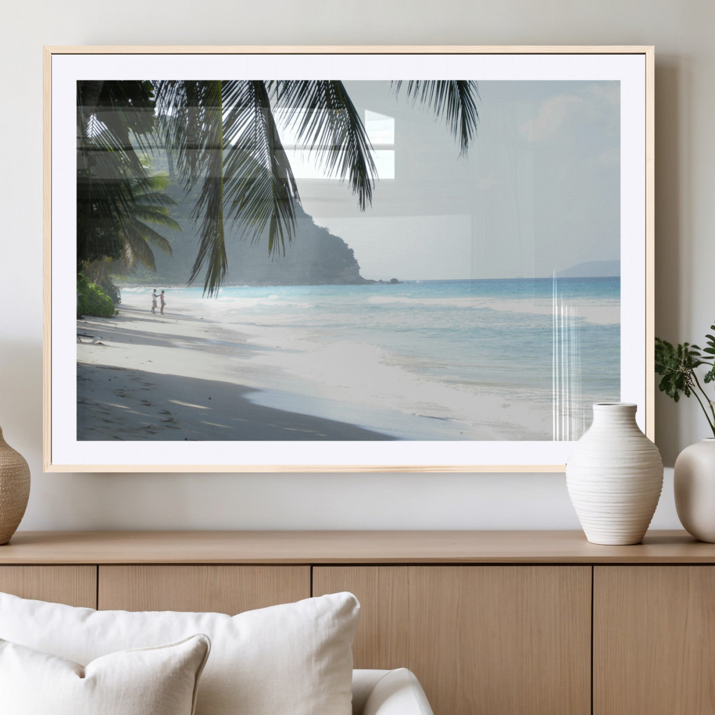 Tropical beach with palm tree shadows, white sand, and turquoise ocean waves, creating a serene and relaxing island escape atmosphere.