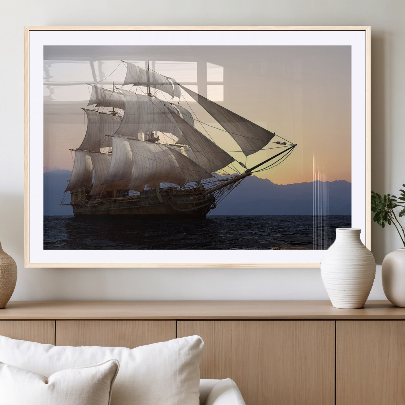 A majestic sailing ship with full sails, gliding through the ocean at sunset, with the soft glow of the sky casting a serene backdrop.