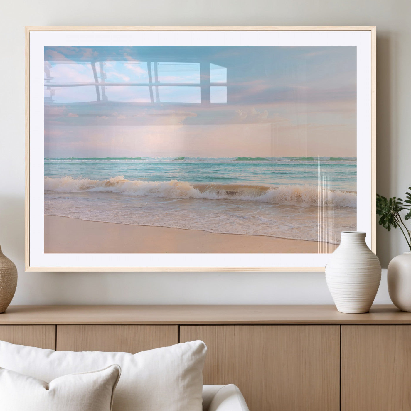 A peaceful beach scene with soft pastel skies, gentle waves washing up on the sandy shore, creating a calm and serene ocean view.
