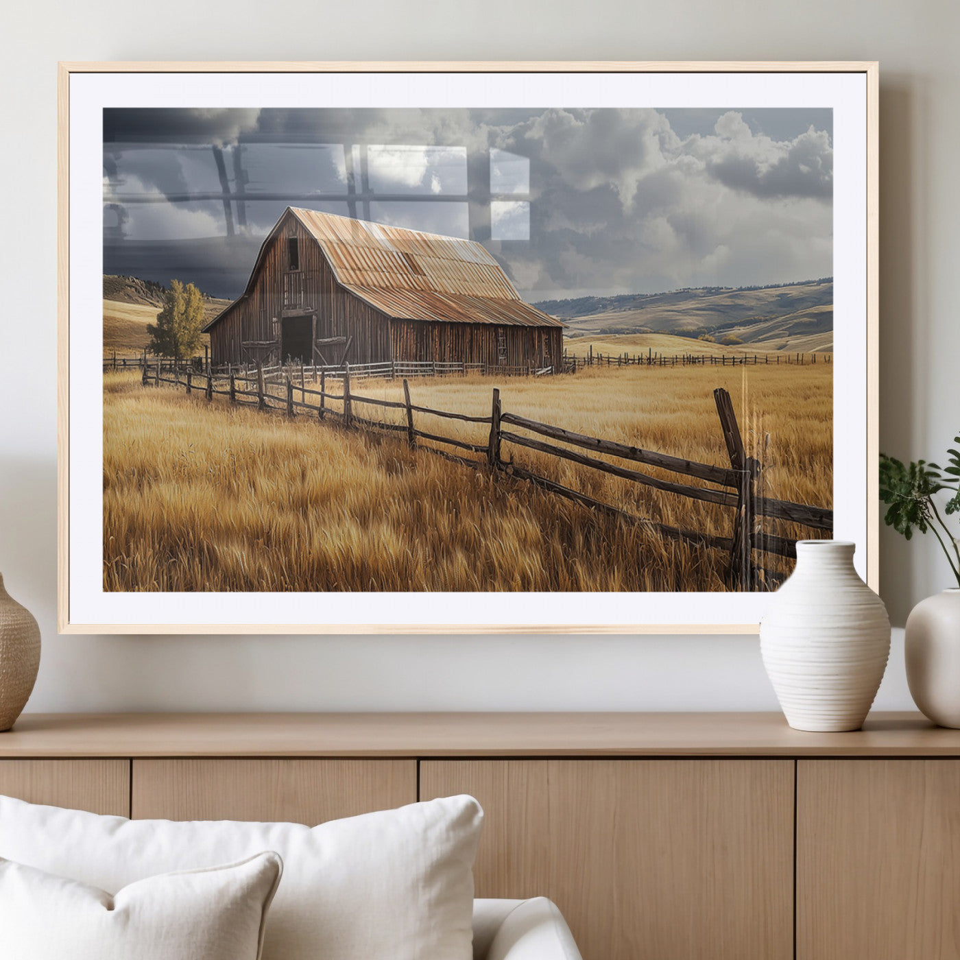 "Rustic barn surrounded by golden fields, a wooden fence, and dramatic storm clouds in the sky, capturing a serene countryside landscape."