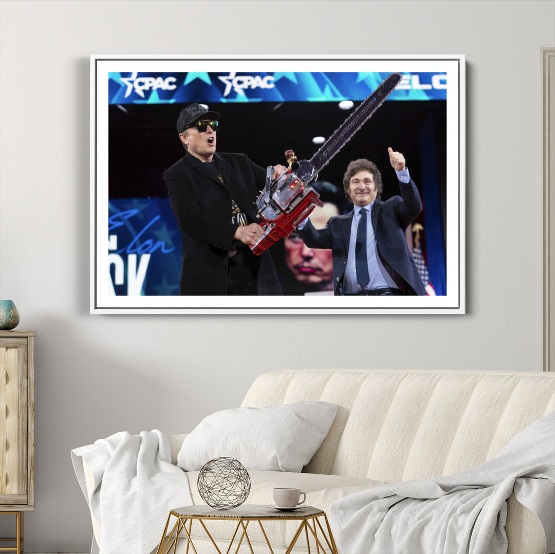 The wall art in the living room is an Elon Musk Chainsaw Art Print, depicting two men with chainsaws on stage in front of a vibrant crowd.