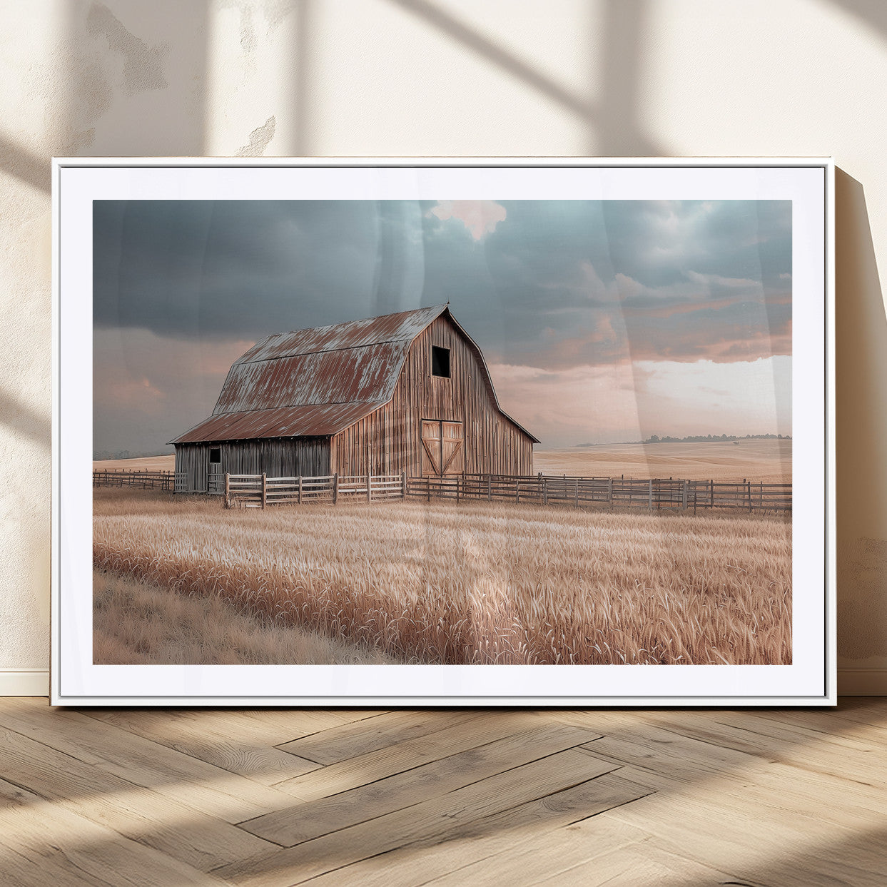Framed canvas of a rustic barn in a golden wheat field under soft skies, ideal for vintage farmhouse or country-style wall decor.