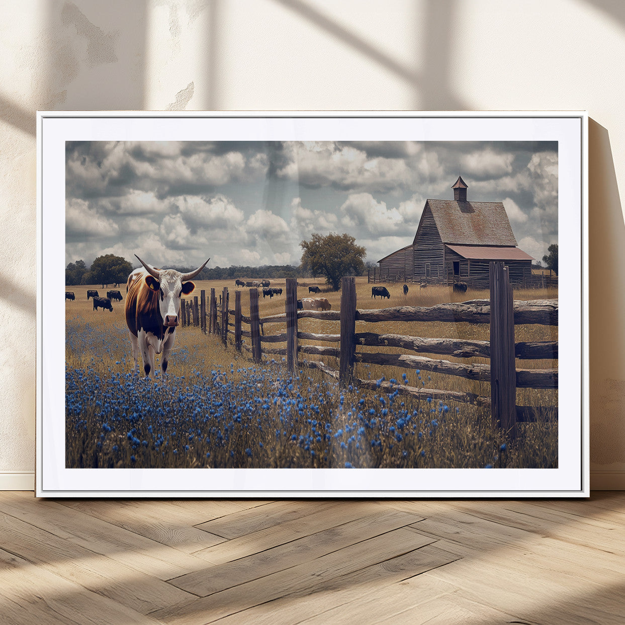Framed canvas print of a Texas Longhorn near a rustic barn and fence, ideal for farmhouse or western-style home wall decor.