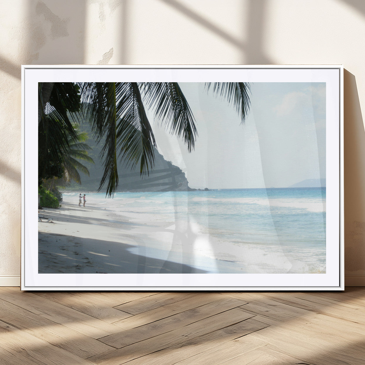 Tropical beach with palm tree shadows, white sand, and turquoise ocean waves, creating a serene and relaxing island escape atmosphere.