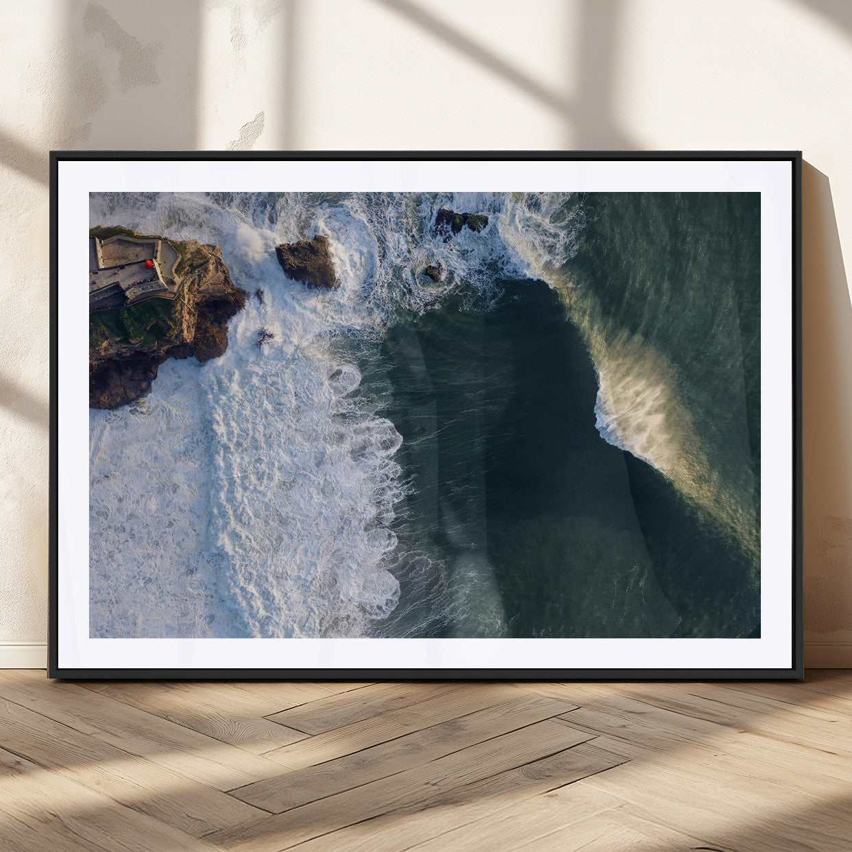 Canvas showing an aerial view of crashing waves along the Nazaré coastline, perfect for dramatic coastal or ocean-themed home decor.