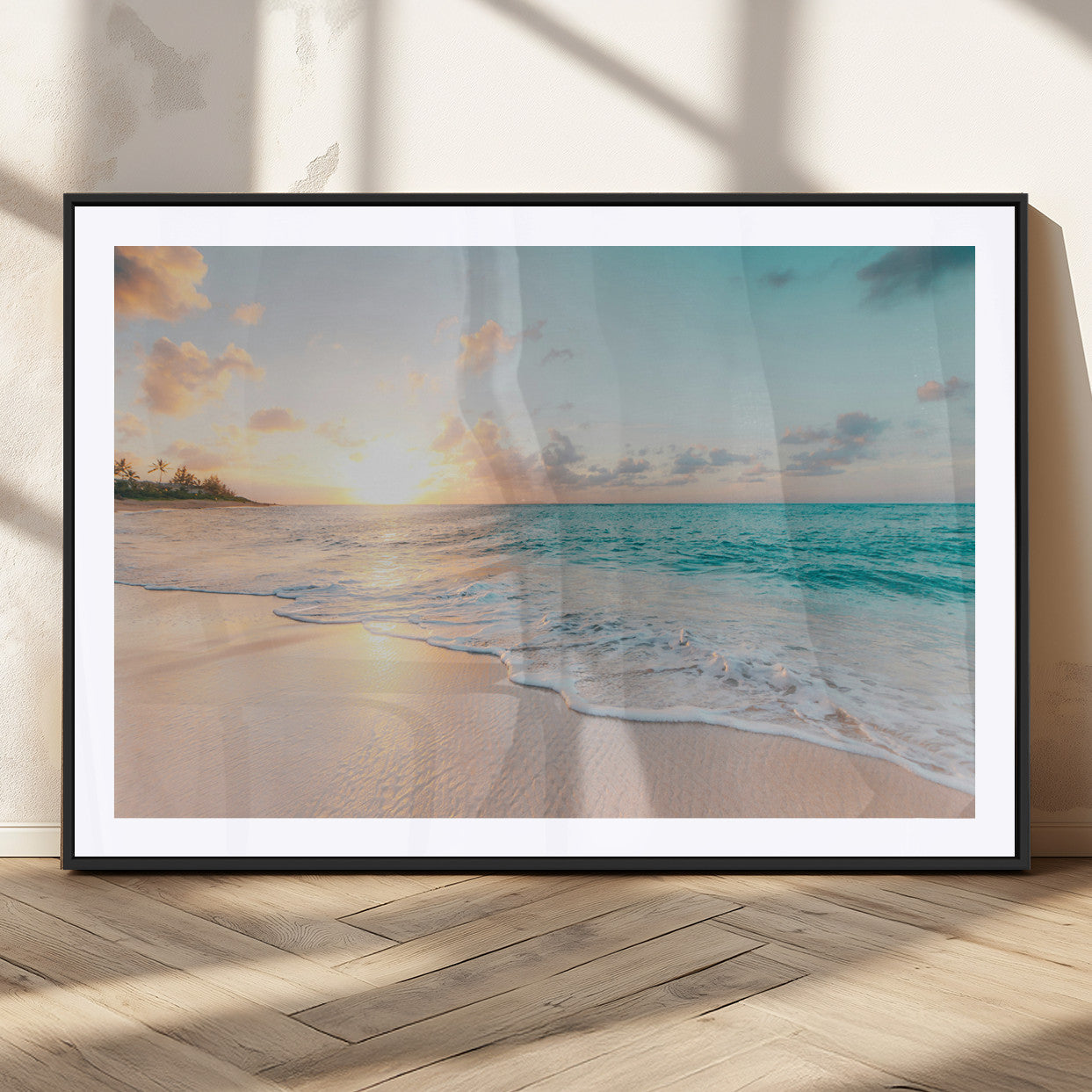 Golden sunset over a tropical beach with gentle ocean waves and soft white sand, creating a peaceful and relaxing coastal scene.