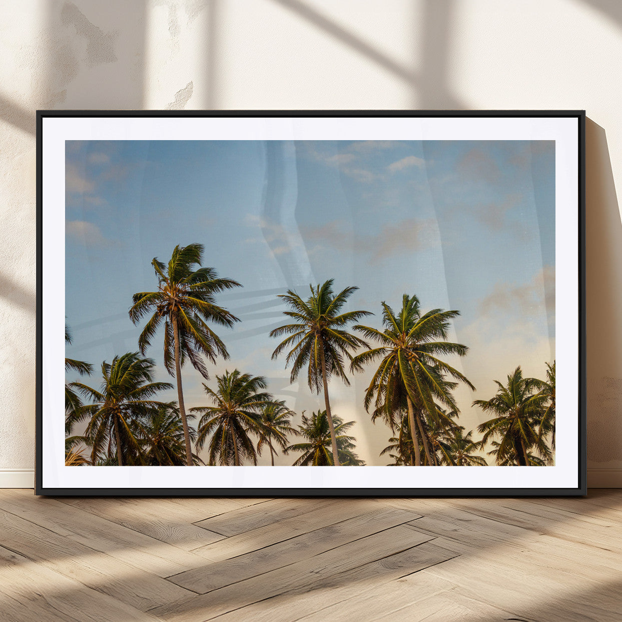 Tall palm trees swaying under a soft sunset sky, creating a tropical and relaxing atmosphere, perfect for coastal and beach-inspired wall art.