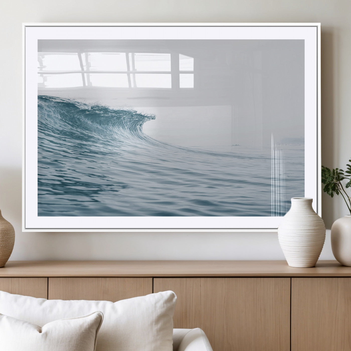 A single ocean wave curling in soft blue tones under a misty sky, ideal for coastal or minimalist home wall decor.