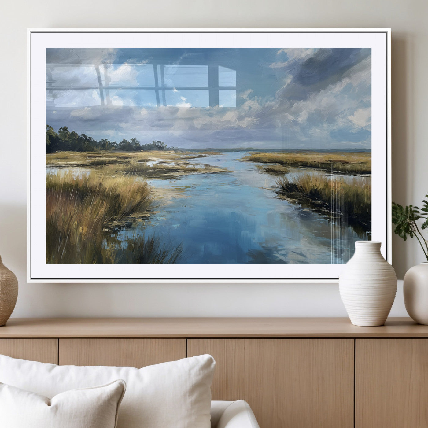 A beautiful, painterly landscape of a calm river winding through a marsh, with vibrant green grasses and a bright blue sky filled with fluffy clouds.