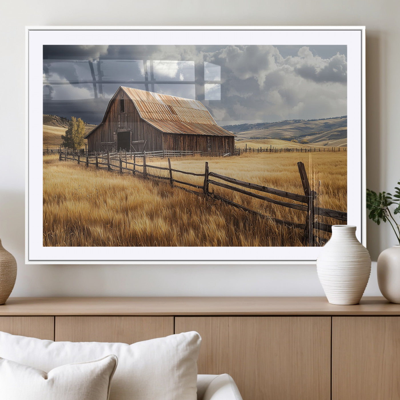 "Rustic barn surrounded by golden fields, a wooden fence, and dramatic storm clouds in the sky, capturing a serene countryside landscape."