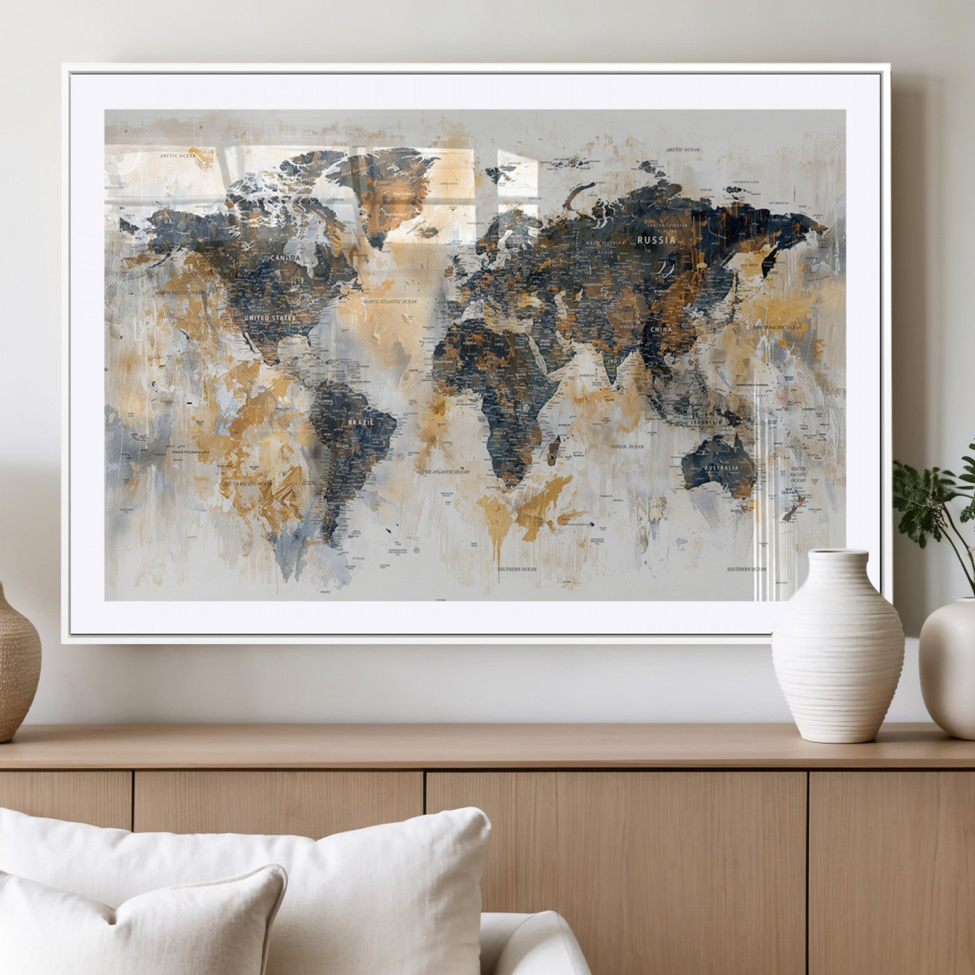 Artistic world map with textured brush strokes in shades of gold, navy blue, and white, showing continents and countries with an abstract, painterly effect.