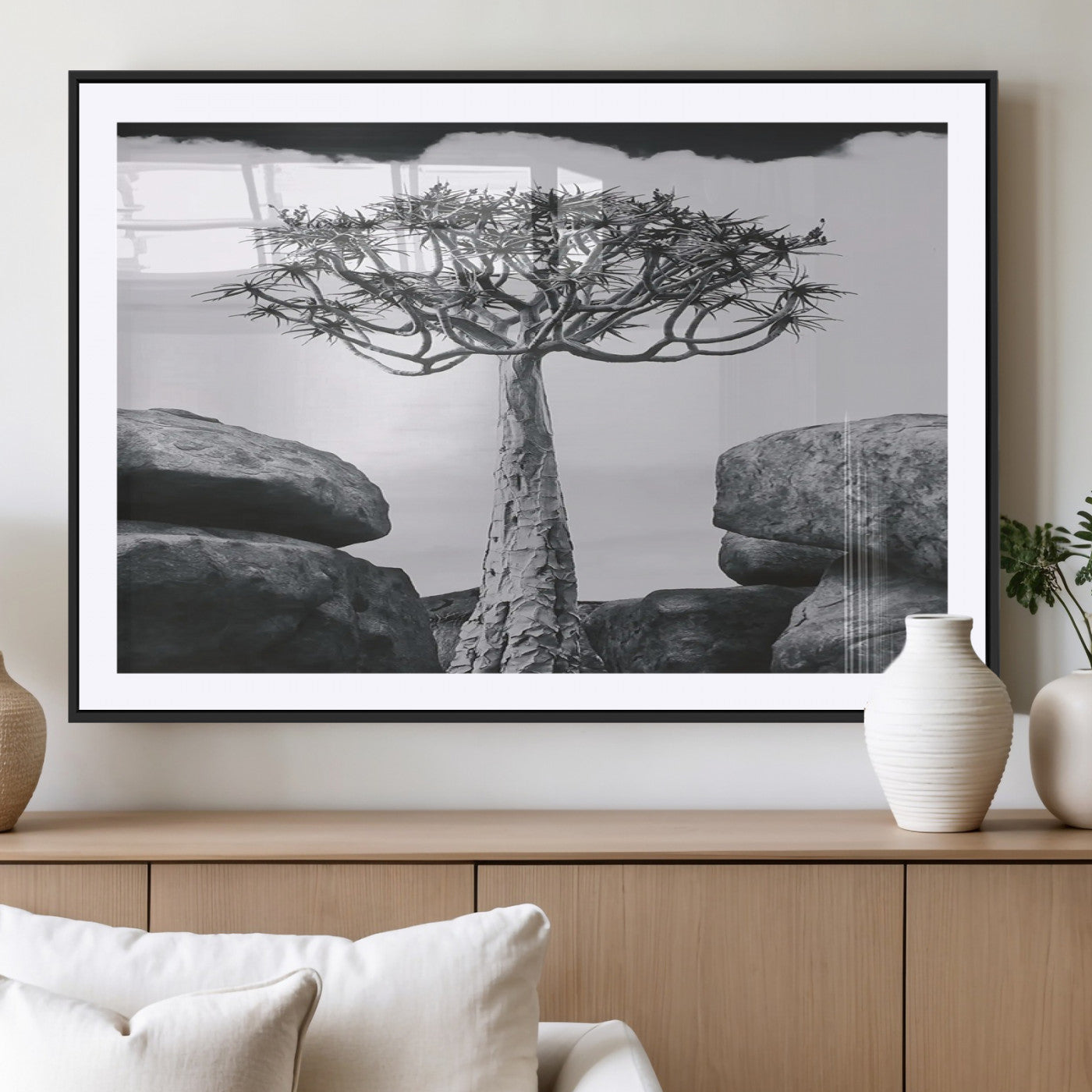 Black and white Joshua tree with bold rocky background, ideal for minimalist or desert-inspired home wall decoration.