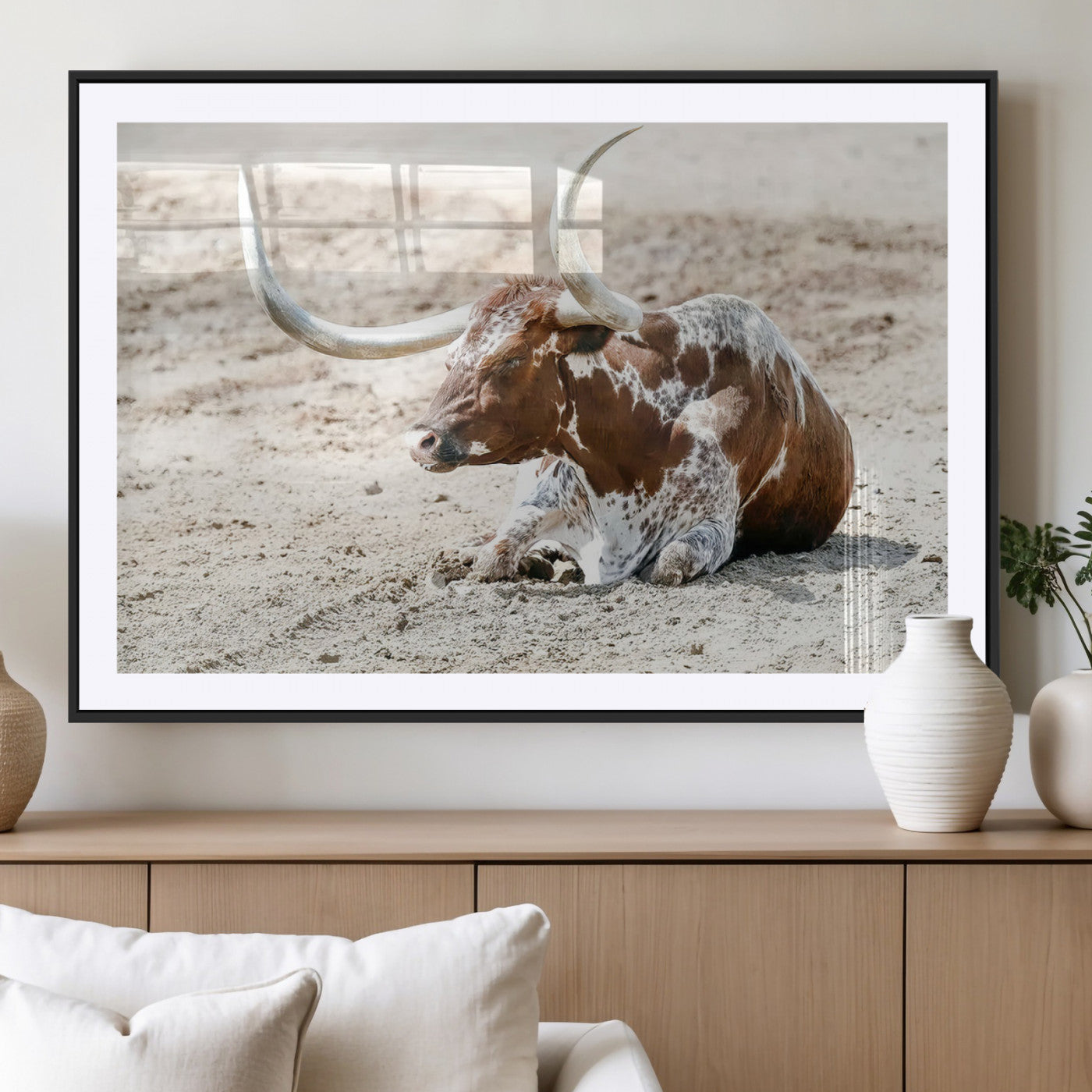 MGC-FP-36x24 - Majestic Longhorn Resting on Sunlit Desert Ground – Striking Western-Themed Wall Art Canvas Print