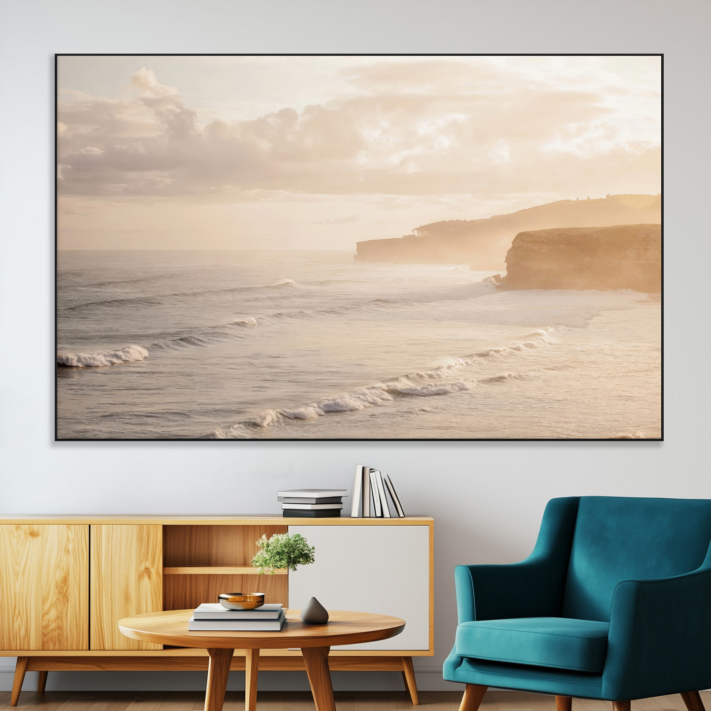 Golden hour seascape with misty cliffs and gentle waves rolling towards the shore, capturing a tranquil and warm coastal atmosphere.