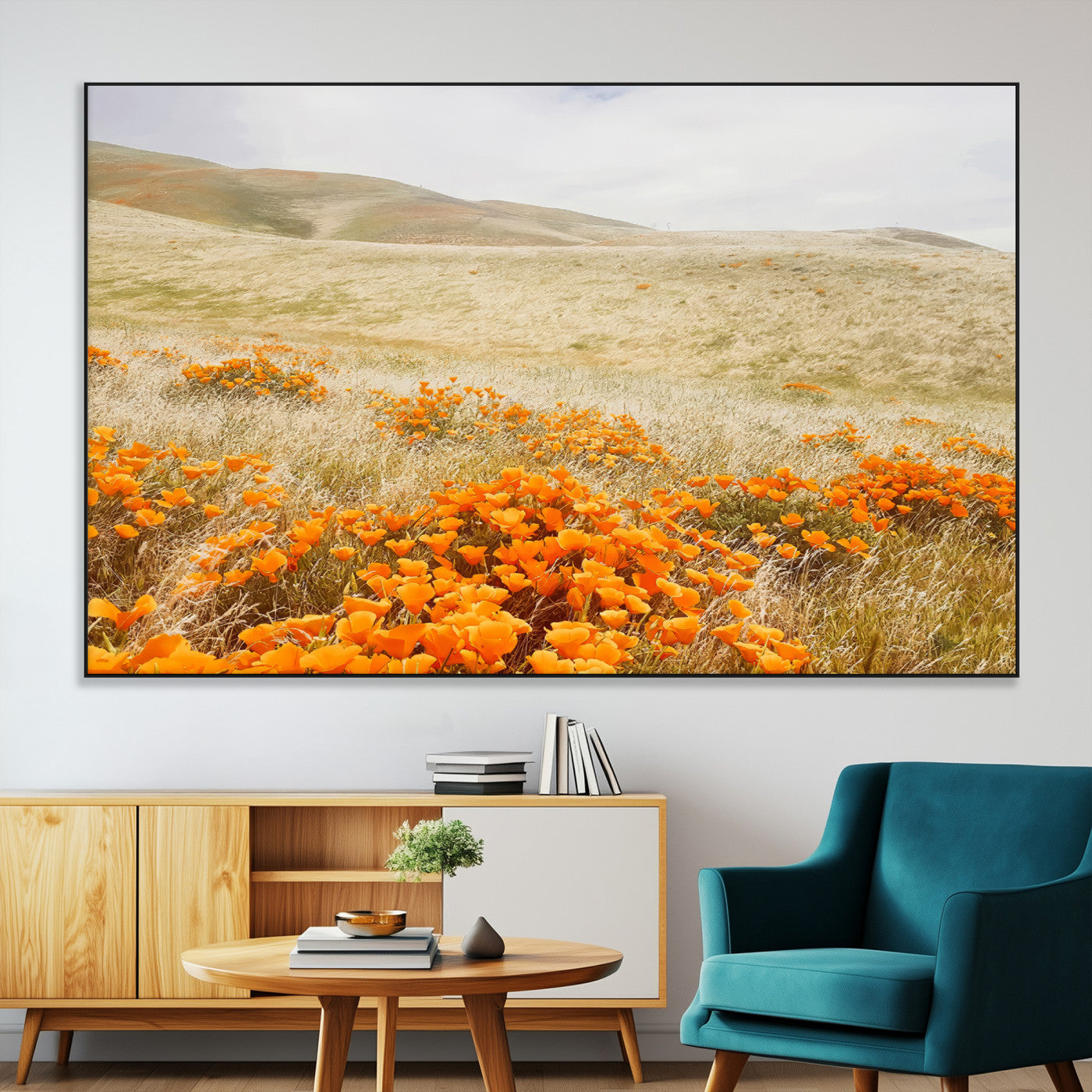 A golden field with vibrant orange poppies blooming across rolling hills under a soft, sunlit sky, creating a warm and rustic landscape.