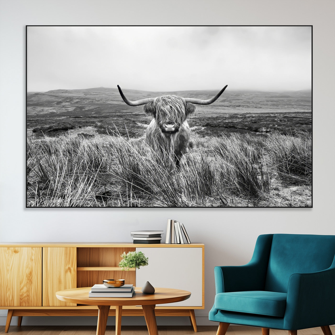 A black and white portrait of a Highland cow in a foggy Scottish countryside, capturing a rustic aesthetic and tranquil farm escape.
