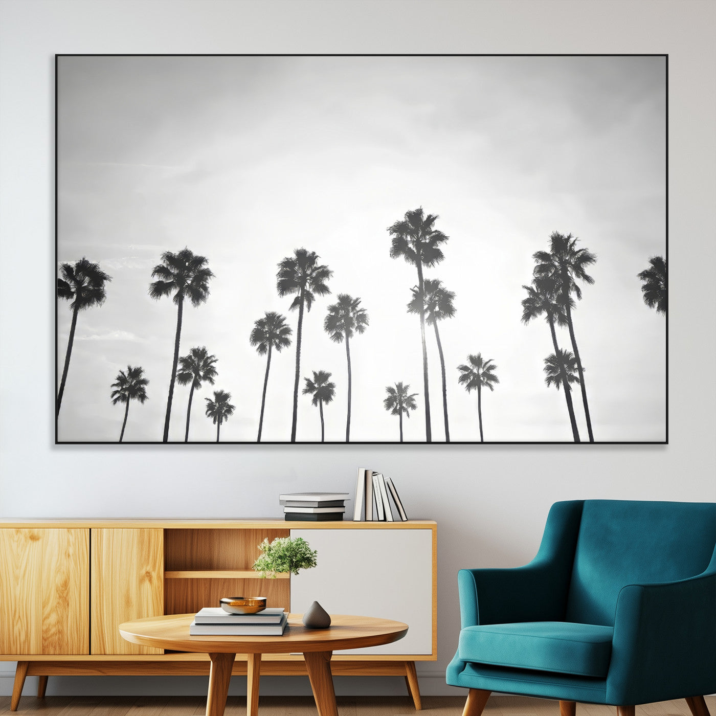 A black and white minimalist scene featuring tall palm trees silhouetted against a bright sky, creating a dreamy and timeless tropical aesthetic.