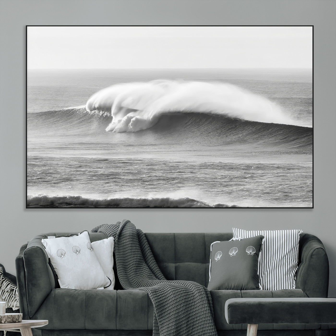 A dramatic black and white ocean wave crashing with immense force, capturing the raw power and movement of the sea in a bold seascape.