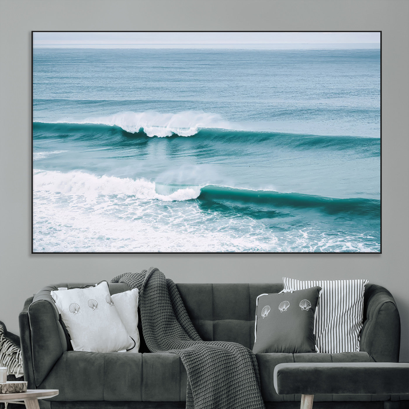 Powerful ocean waves rolling towards the shore, their turquoise hues blending with white sea foam under an open horizon, capturing the essence of the ocean's movement.