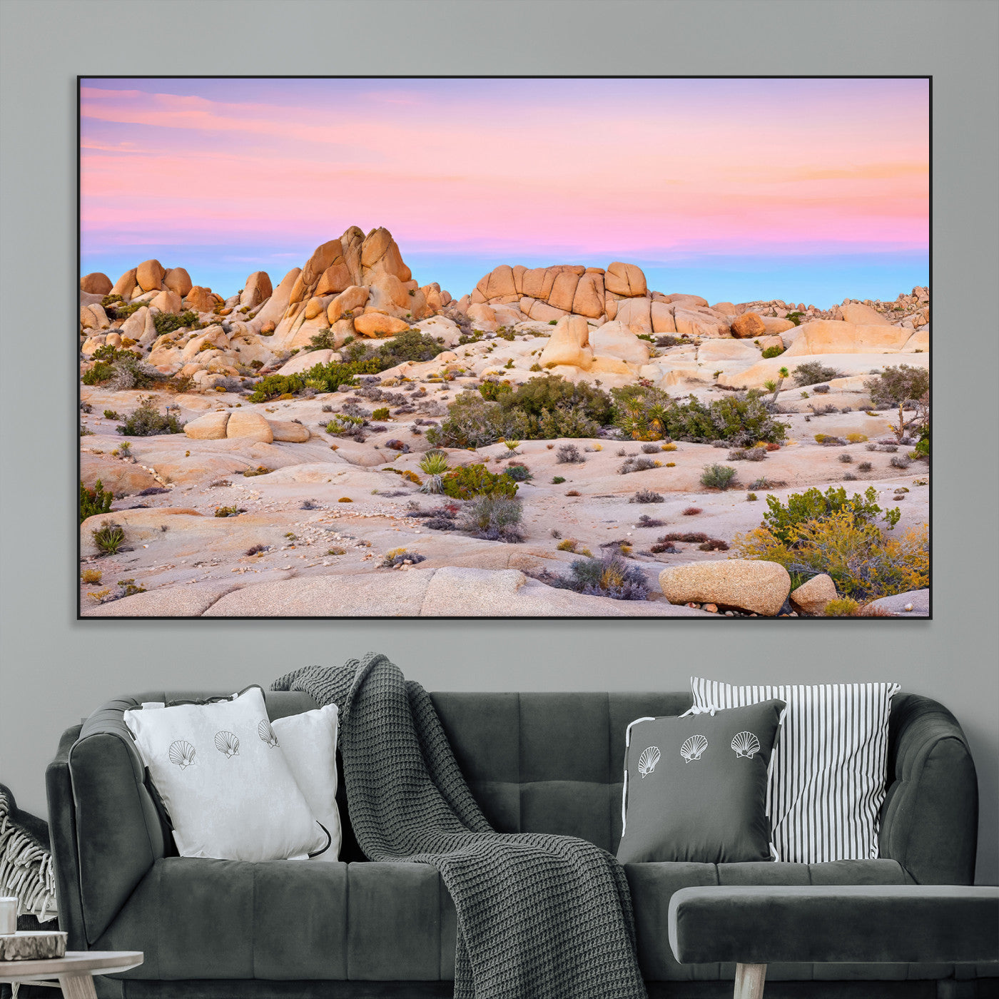 A breathtaking desert landscape featuring rugged rock formations under a vibrant pastel sunset sky, capturing the warmth and serenity of a Southwestern wilderness.